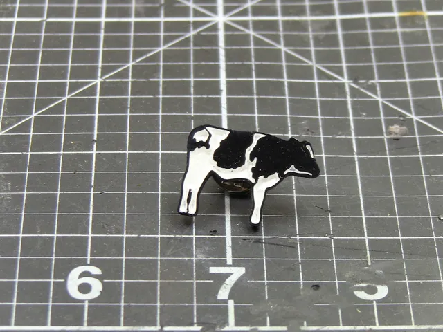 Cow enamel pin