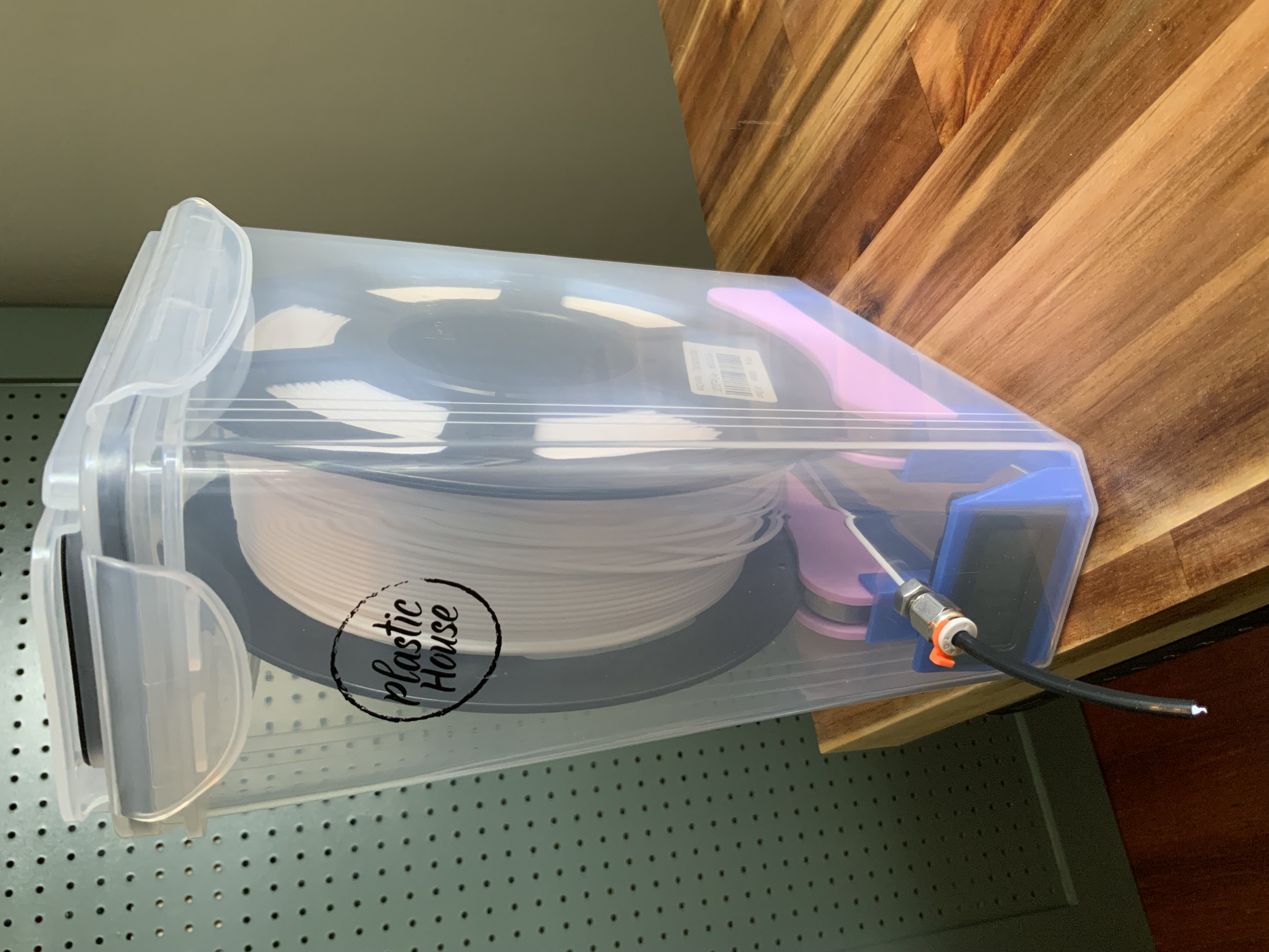 Plastic House cereal box filament holder