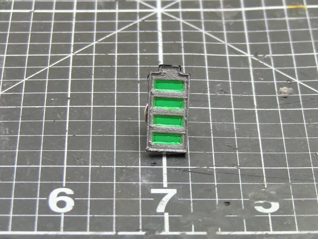 Battery enamel pin