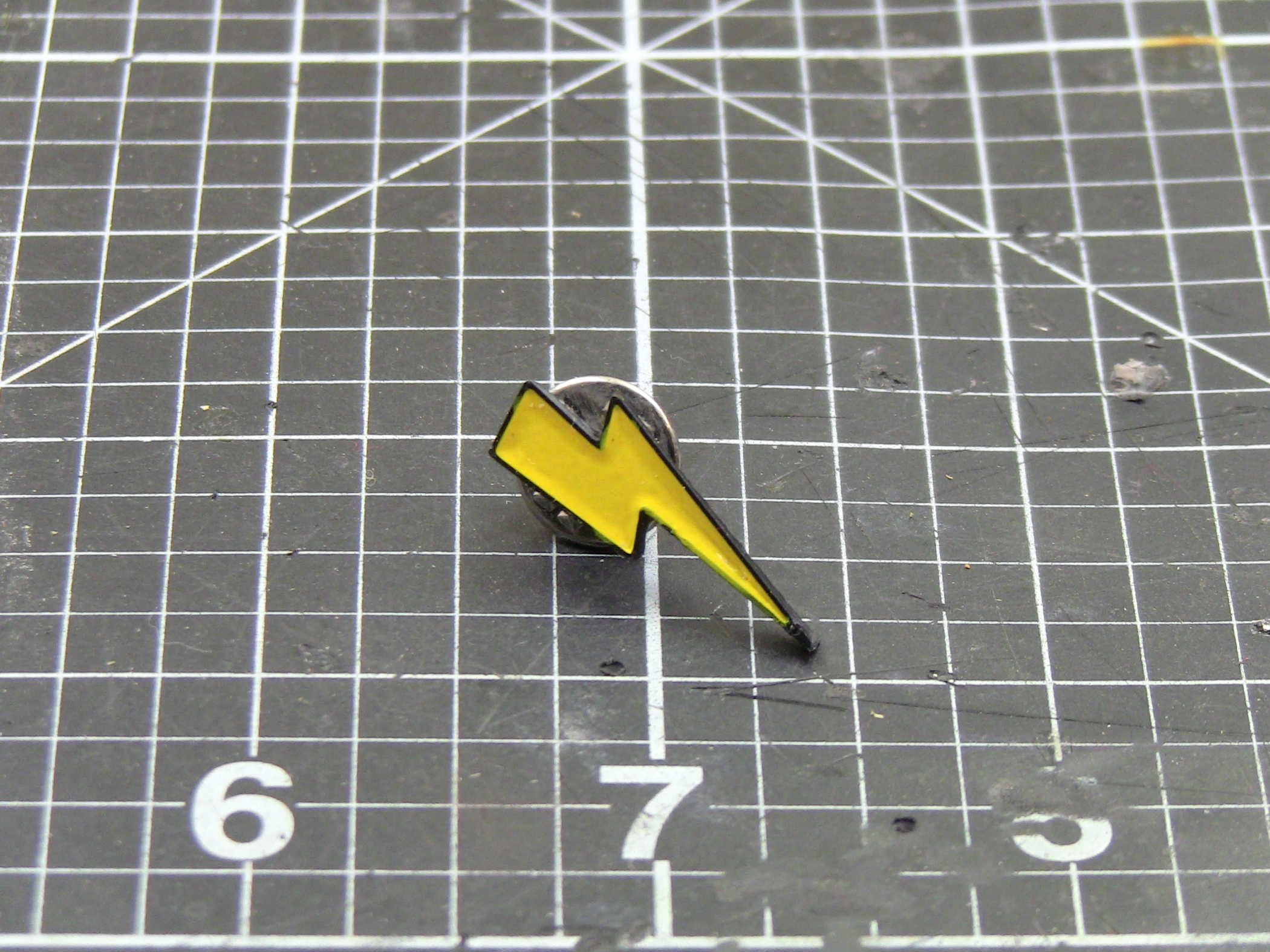 Lighting bolt enamel pin