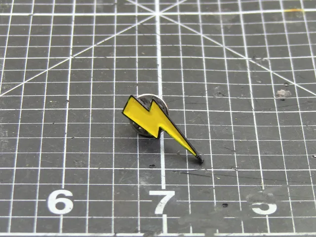 Lighting bolt enamel pin