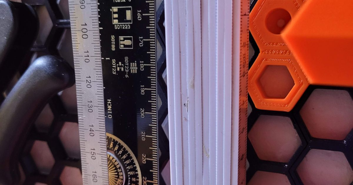 Ruler and folding tape measure holder for by Vladimír