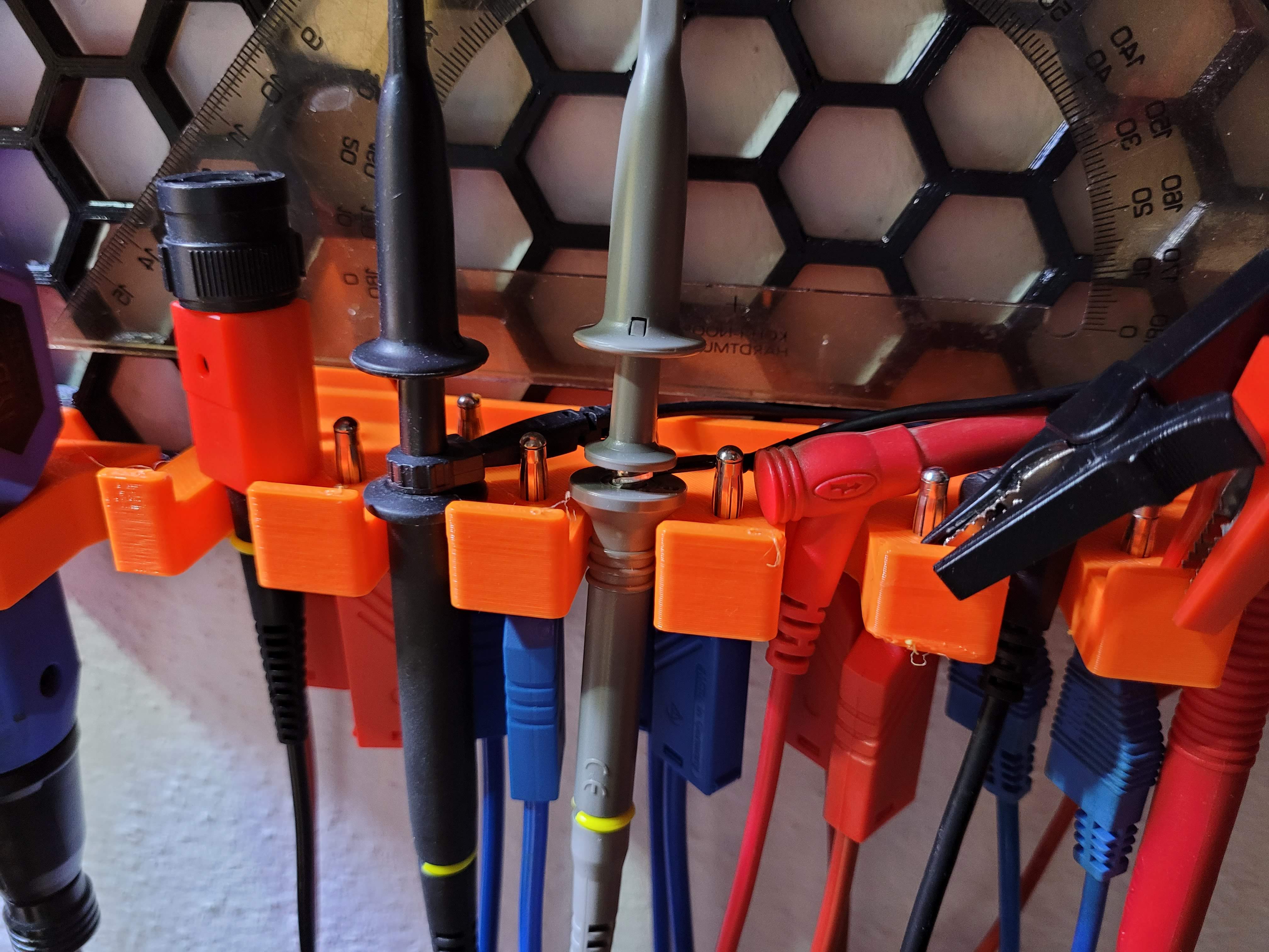 Cable holder for storage wall by Vladimír Waas Download