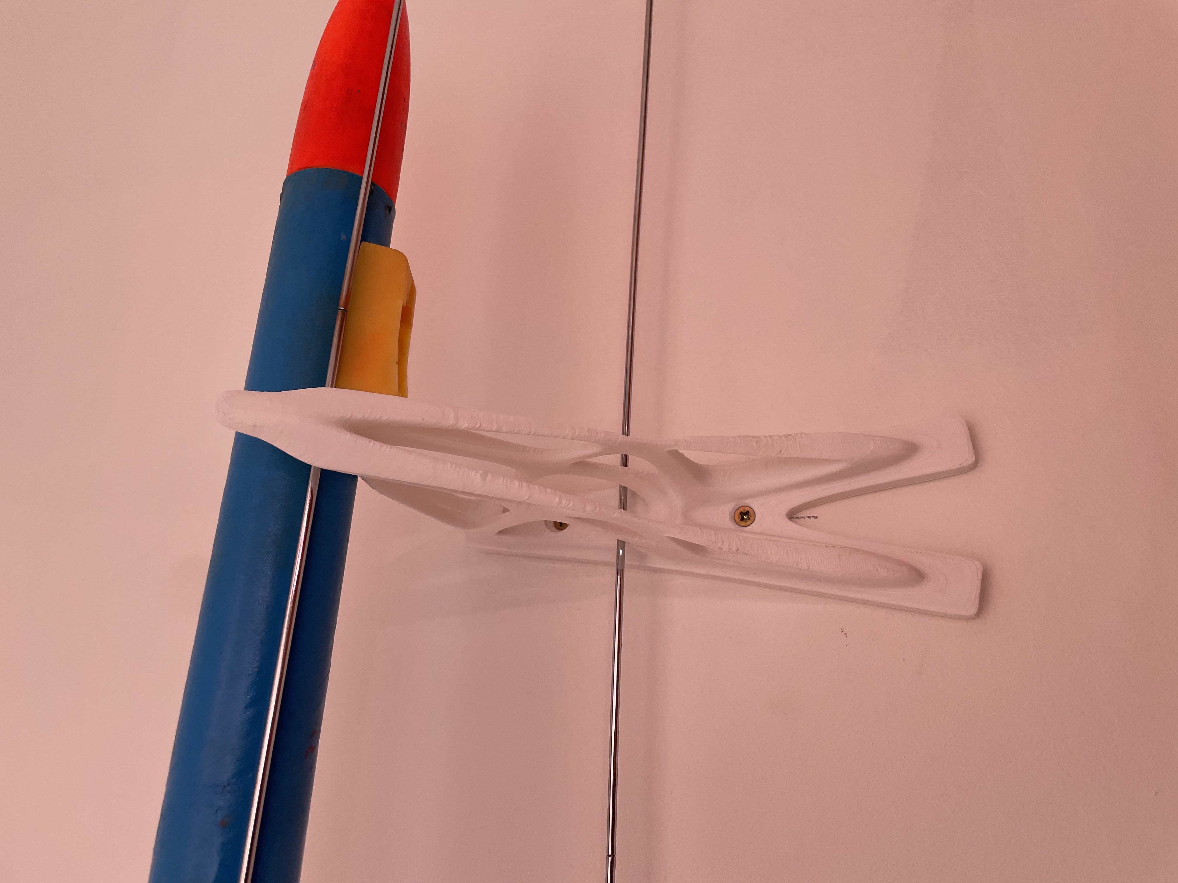 Wall bracket for storing model rockets