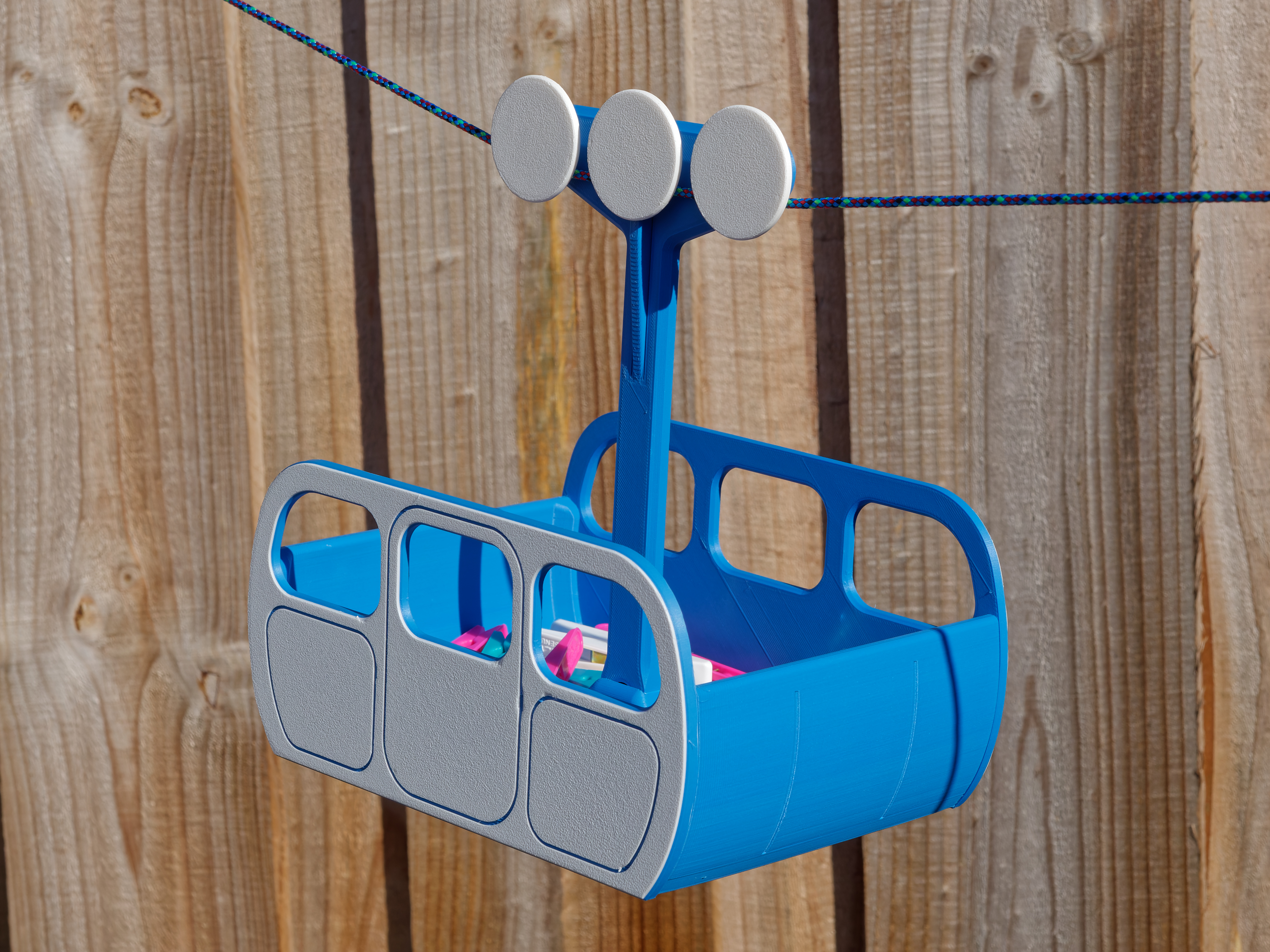 Cable car clothes peg basket