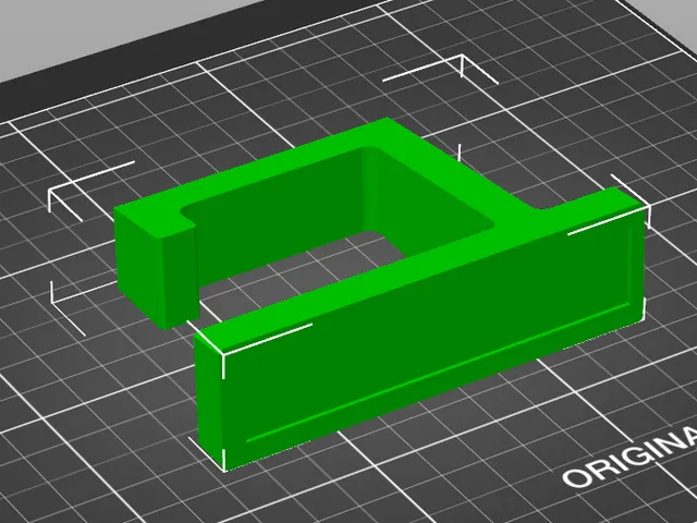 Under-desk headphone hook using command strip