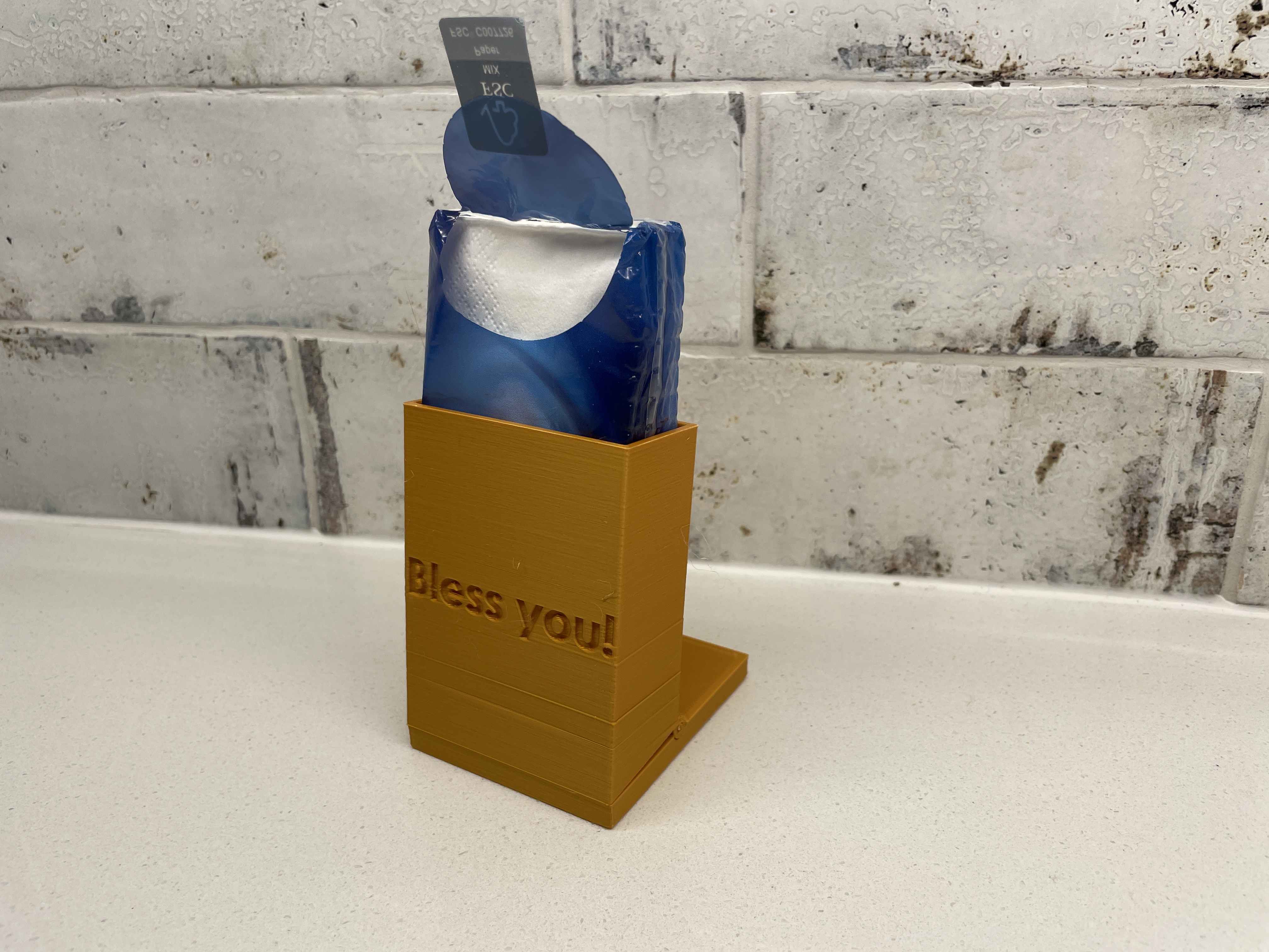 Folding tissue holder
