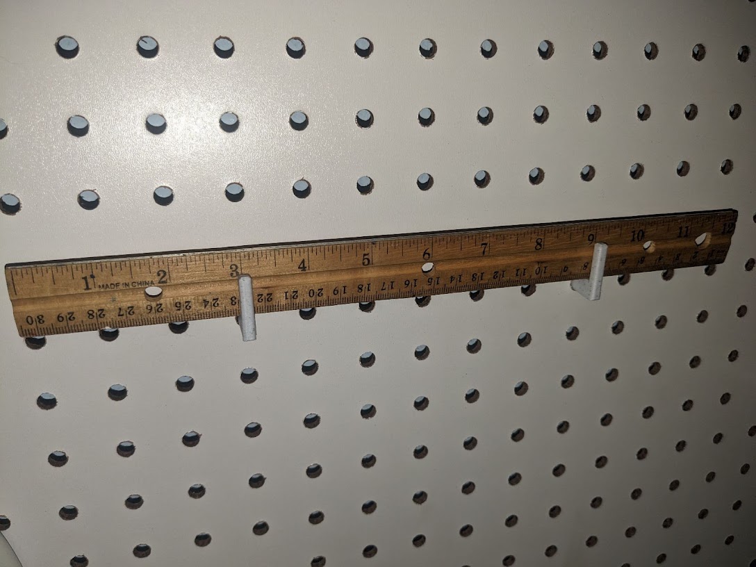Ruler Holder for Pegboard by Illiterate Chicken Download free STL