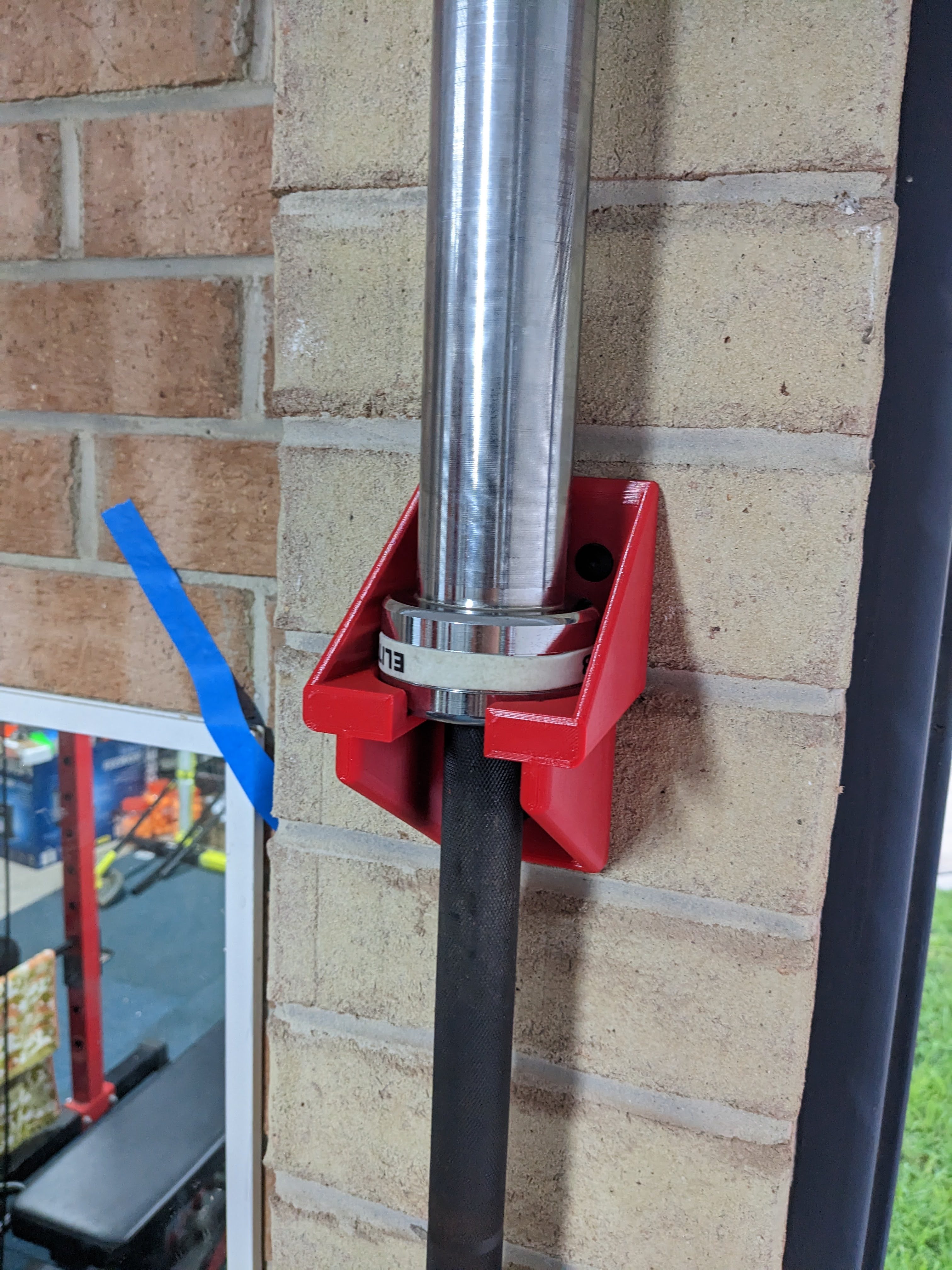 Olympic Barbell Vertical Wall Mount + Bumper
