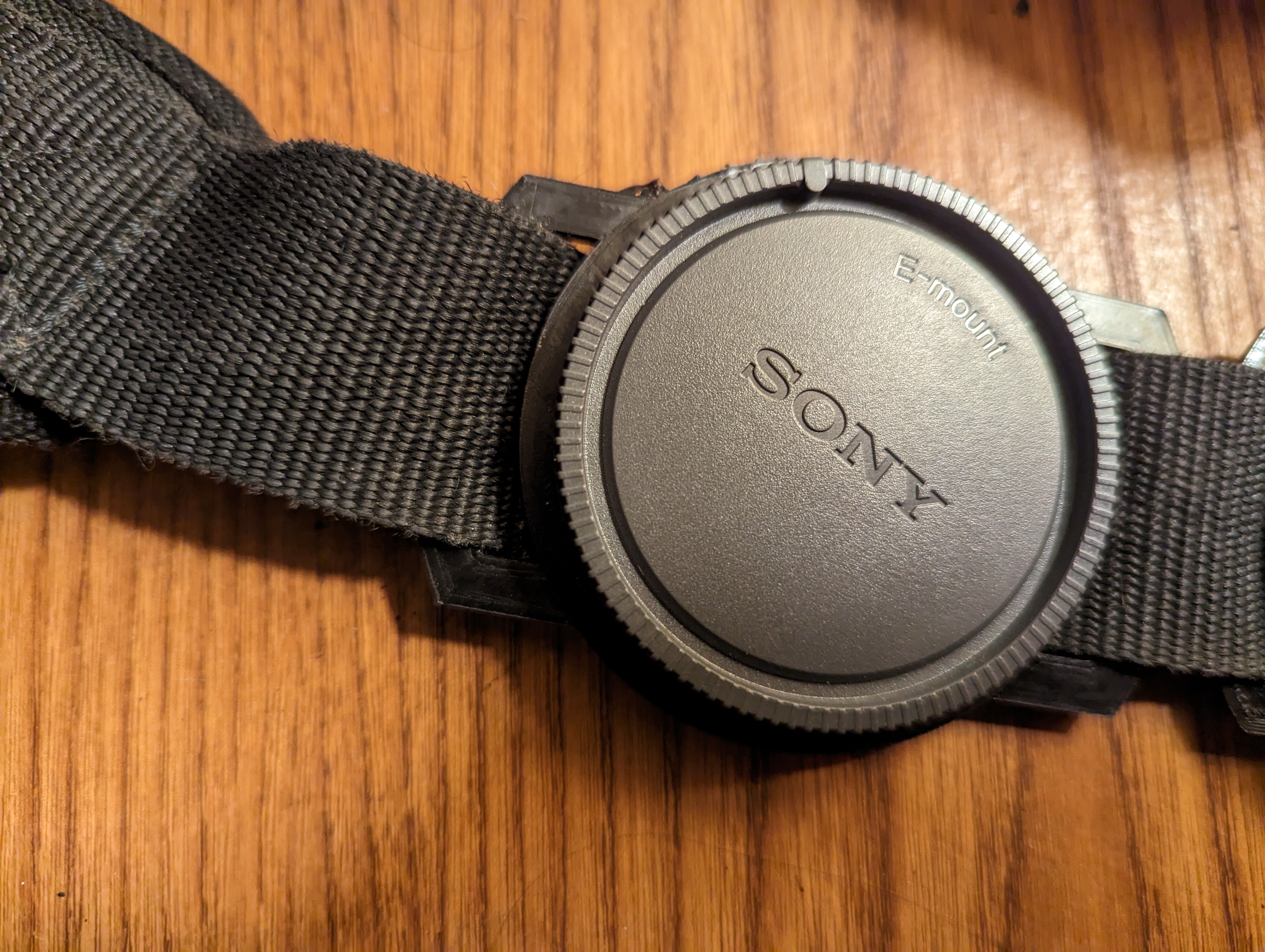 Sony E-mount rear cap holder for backpack