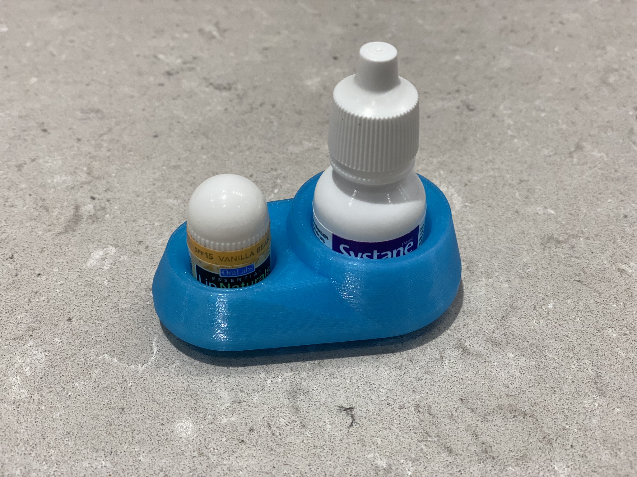 Holder for lip balm and eye drops