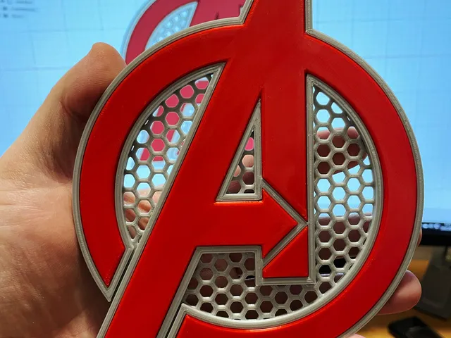 Avengers Logo with hexagon grid