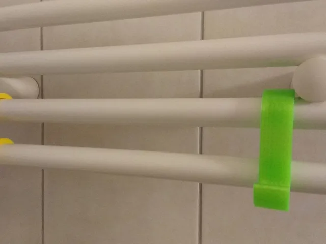 Parametric radiator towel hook