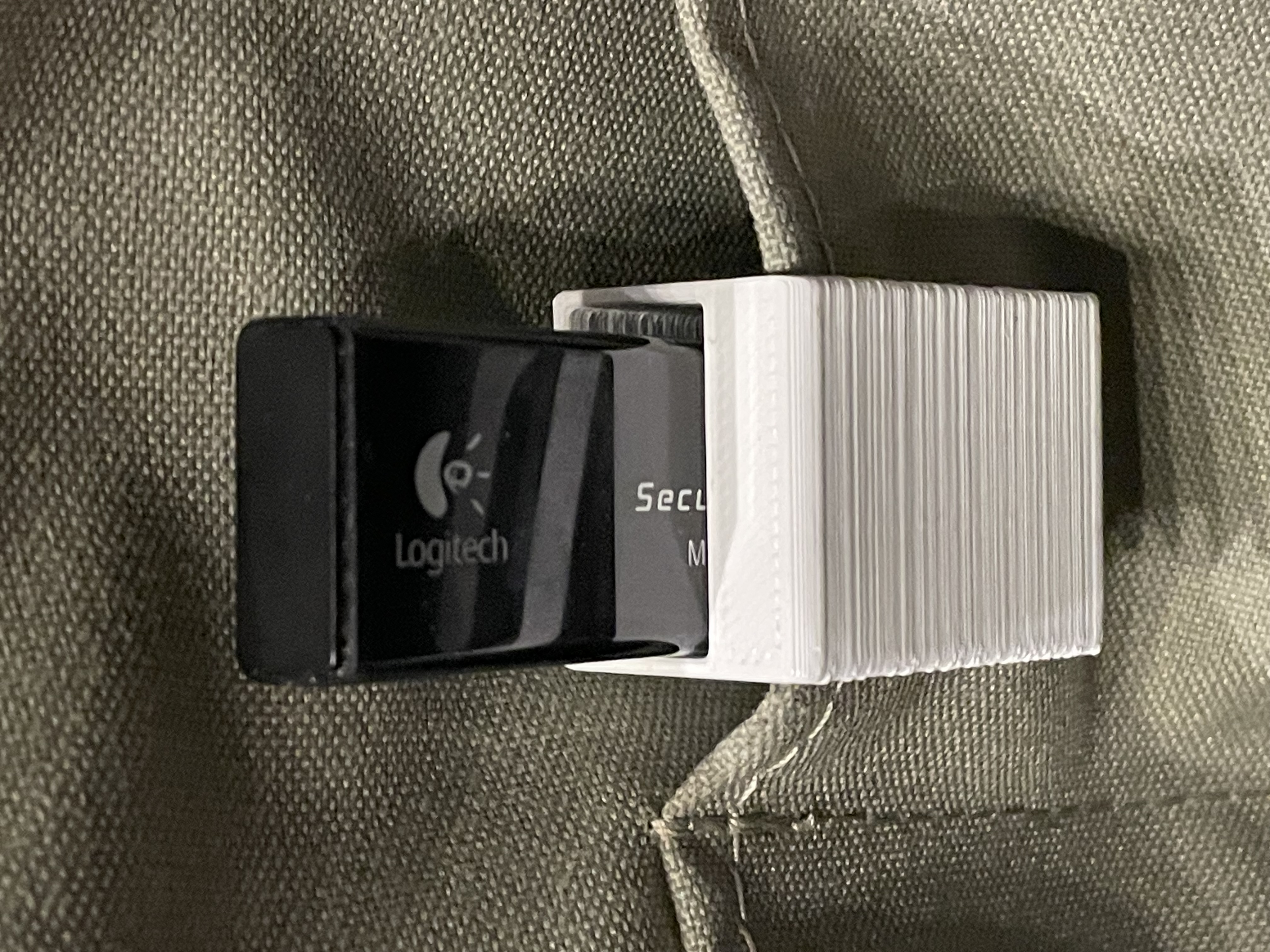 Holder for USB dongle for keyboards to clip it to the office bag