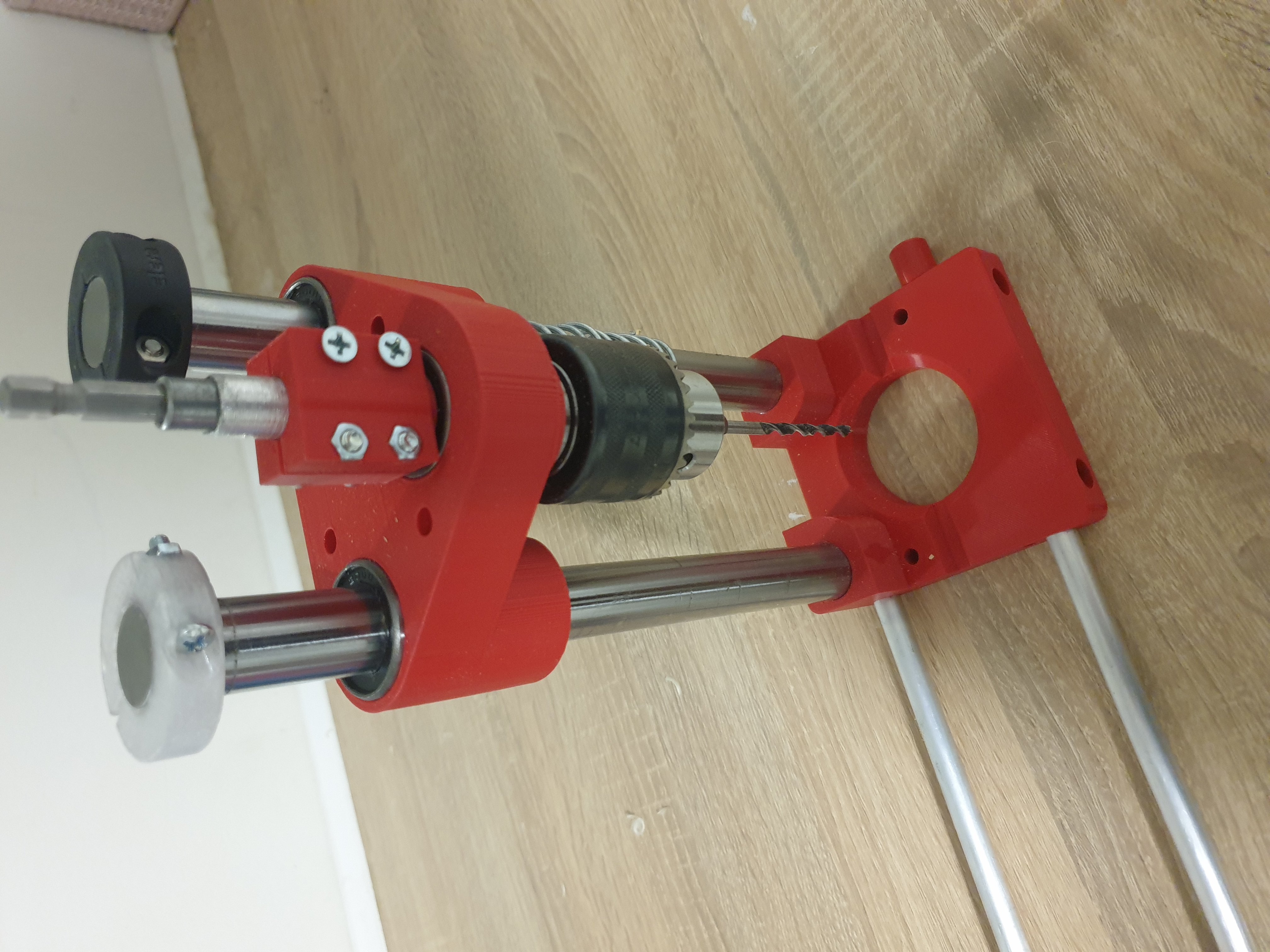 Drill press with linear guide