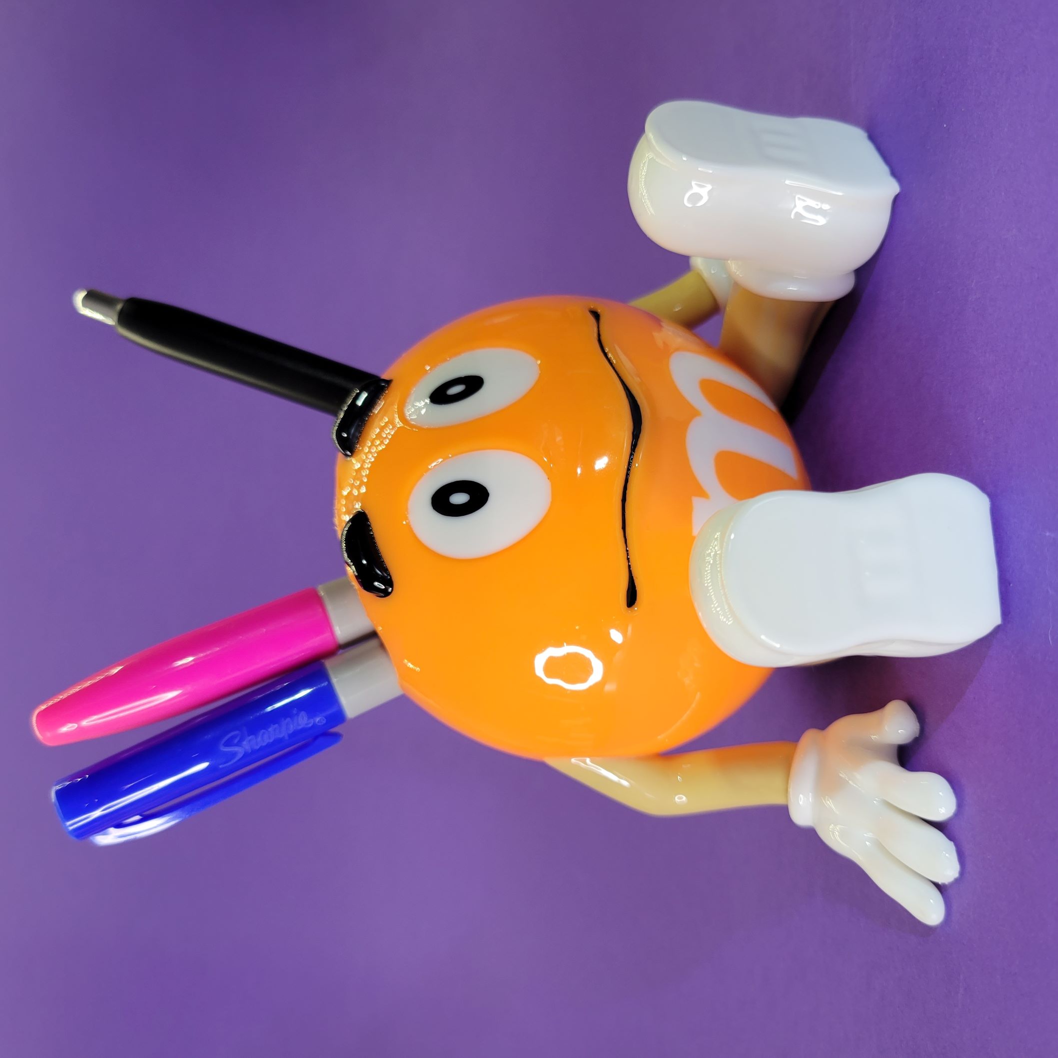 Orange M&M pencil holder