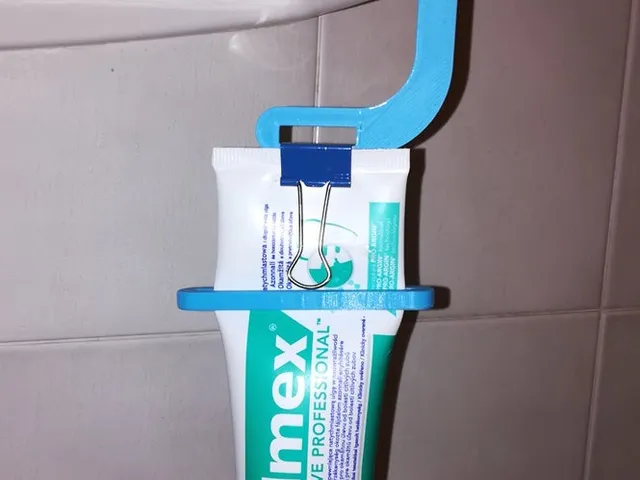 Toothpaste Hanger and Squeezer