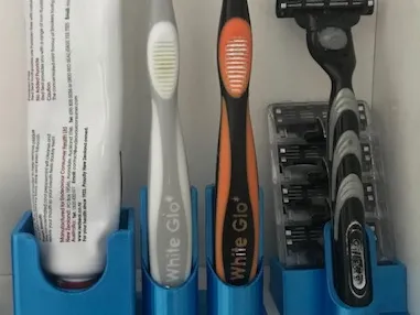 Toothpaste and toothbrush holder