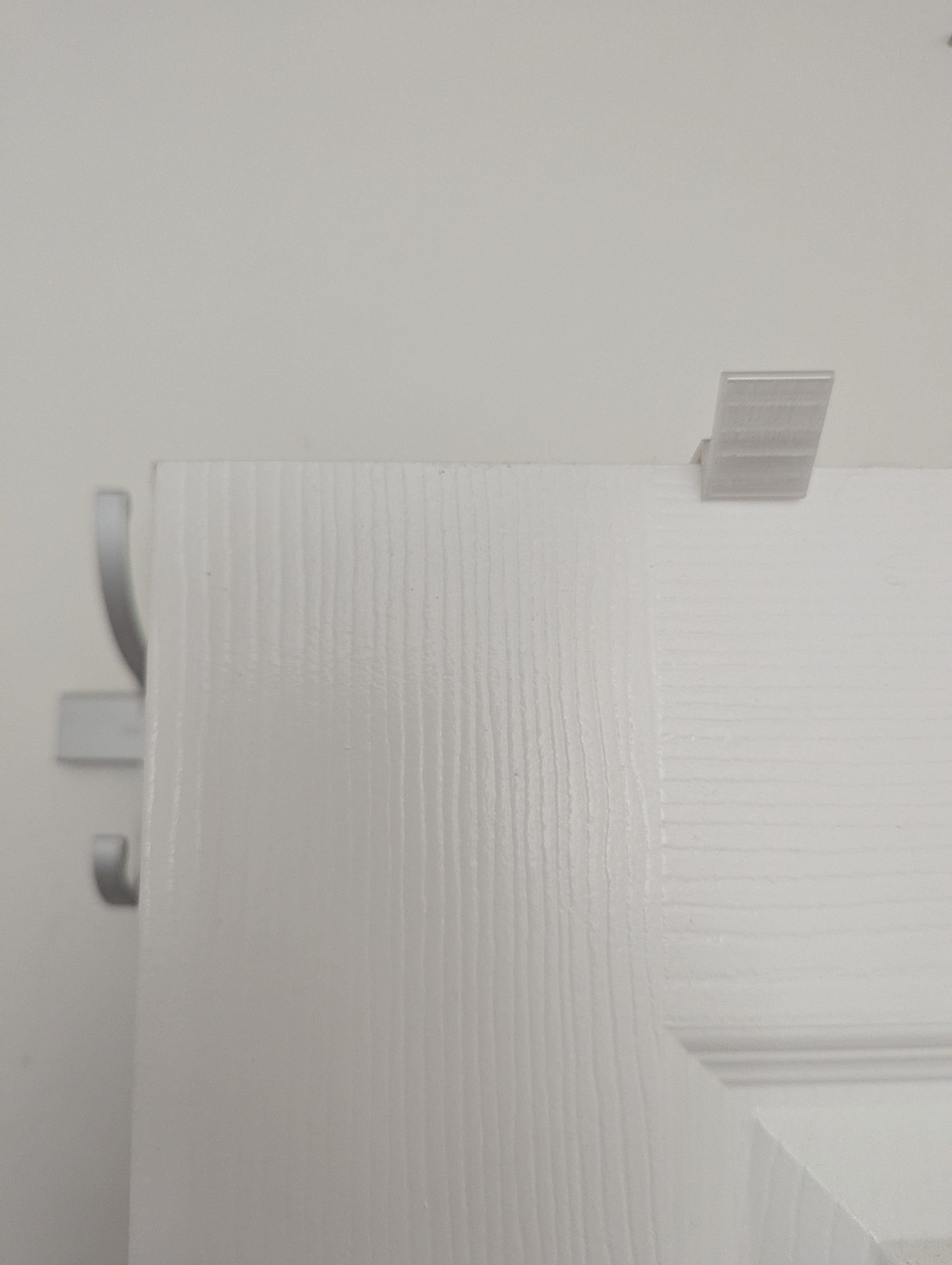 Door stop for top of the door