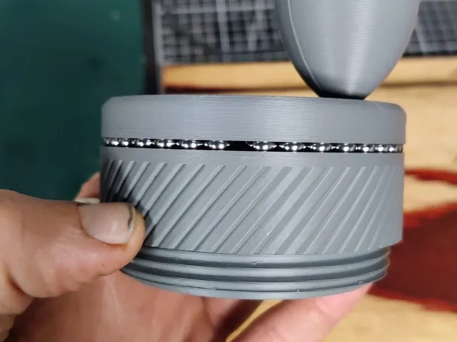 Umikot - large handle + roller bearings between spin ring and upper mech
