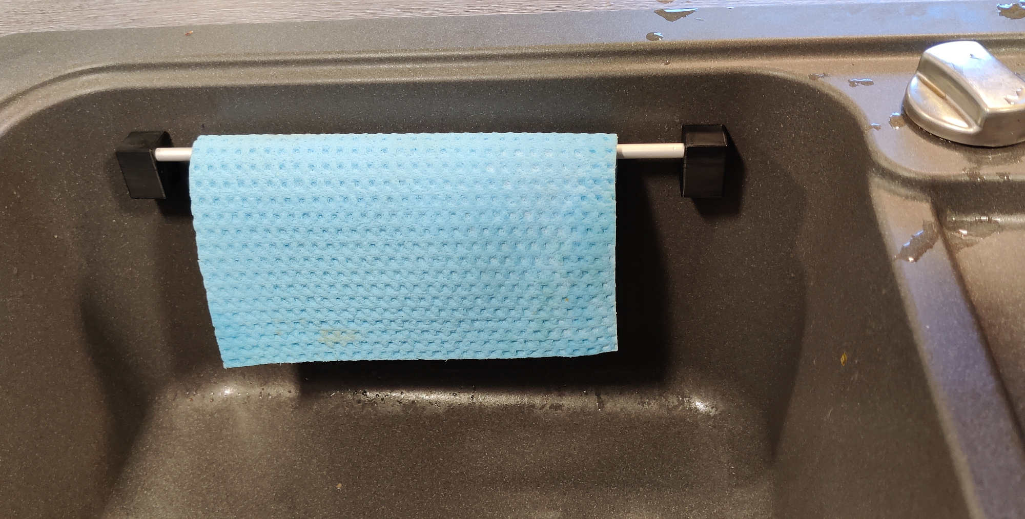 Magnetic dishtowel holder