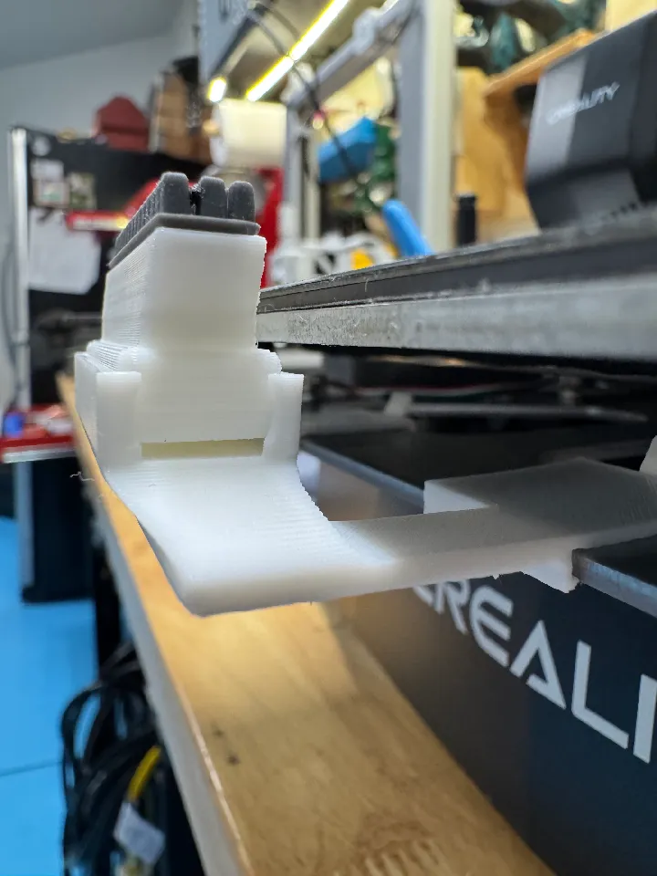 Ender 3 V3 SE/KE Automatic Brush Nozzle Cleaner by Dane Reasenberg