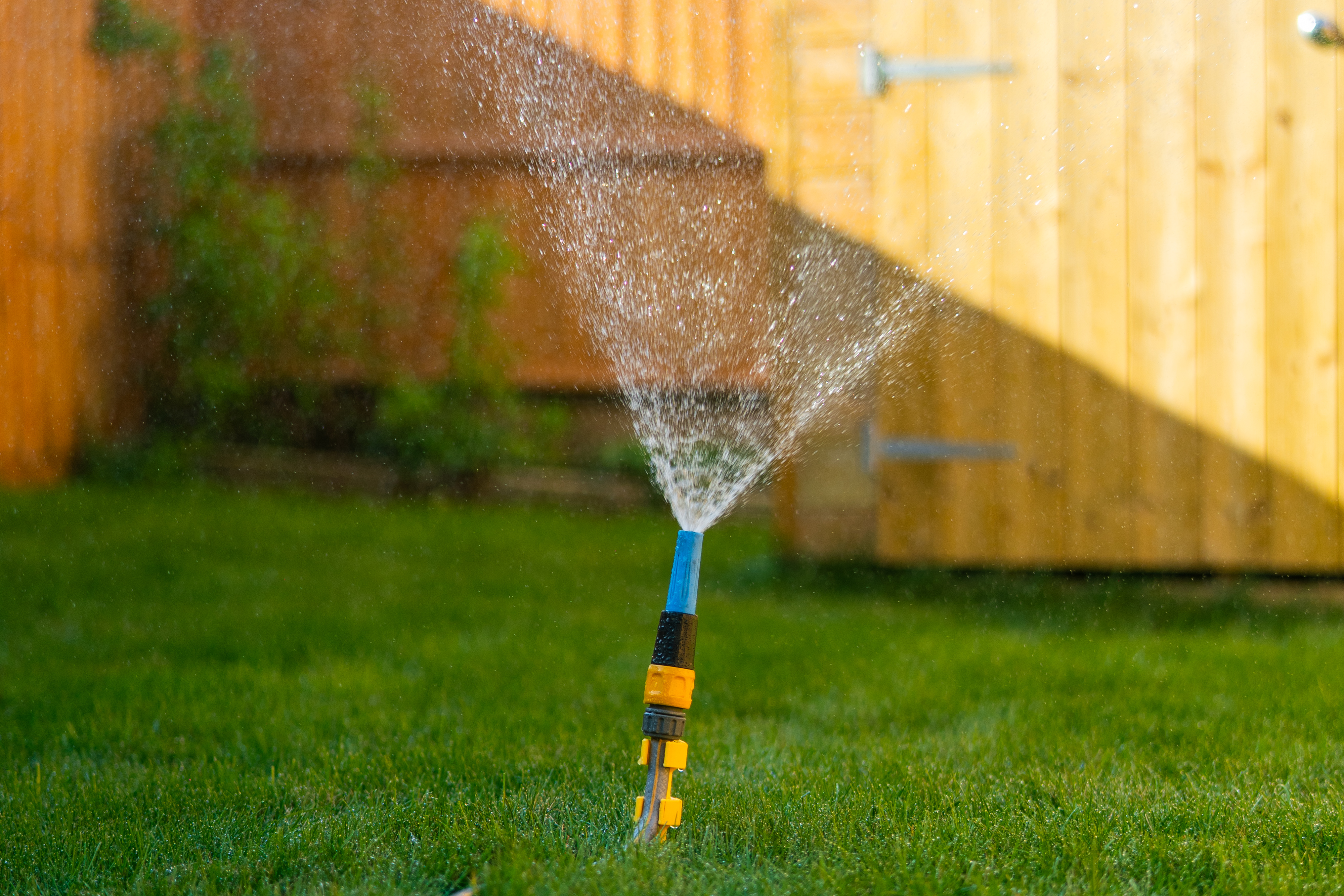 Turn your garden hose into a sprinkler