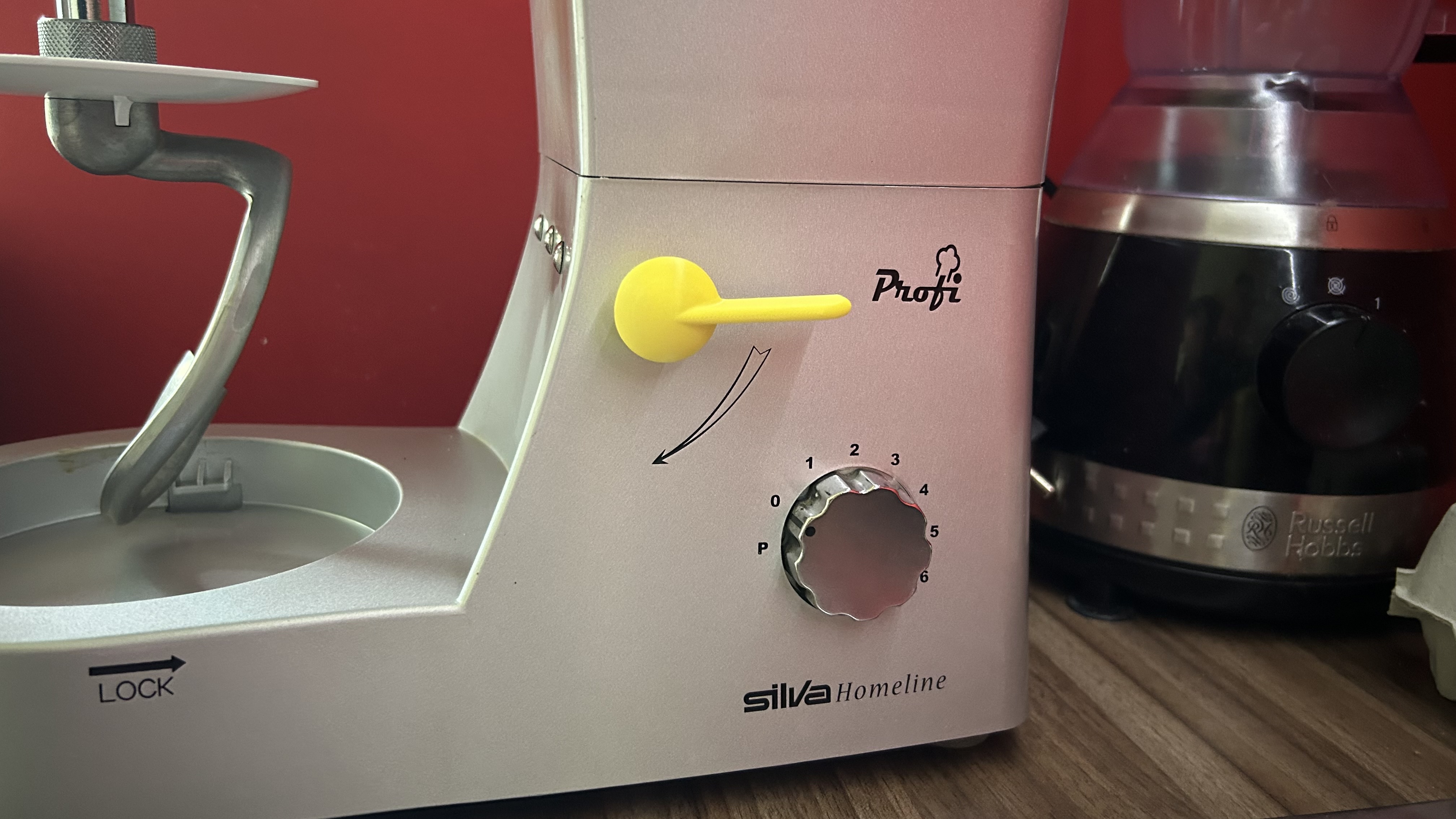 Multifunction blender release lever