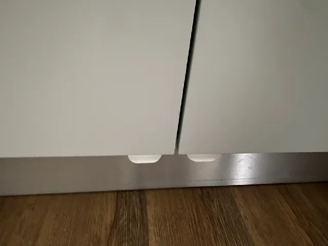 Foot cabinet door opener