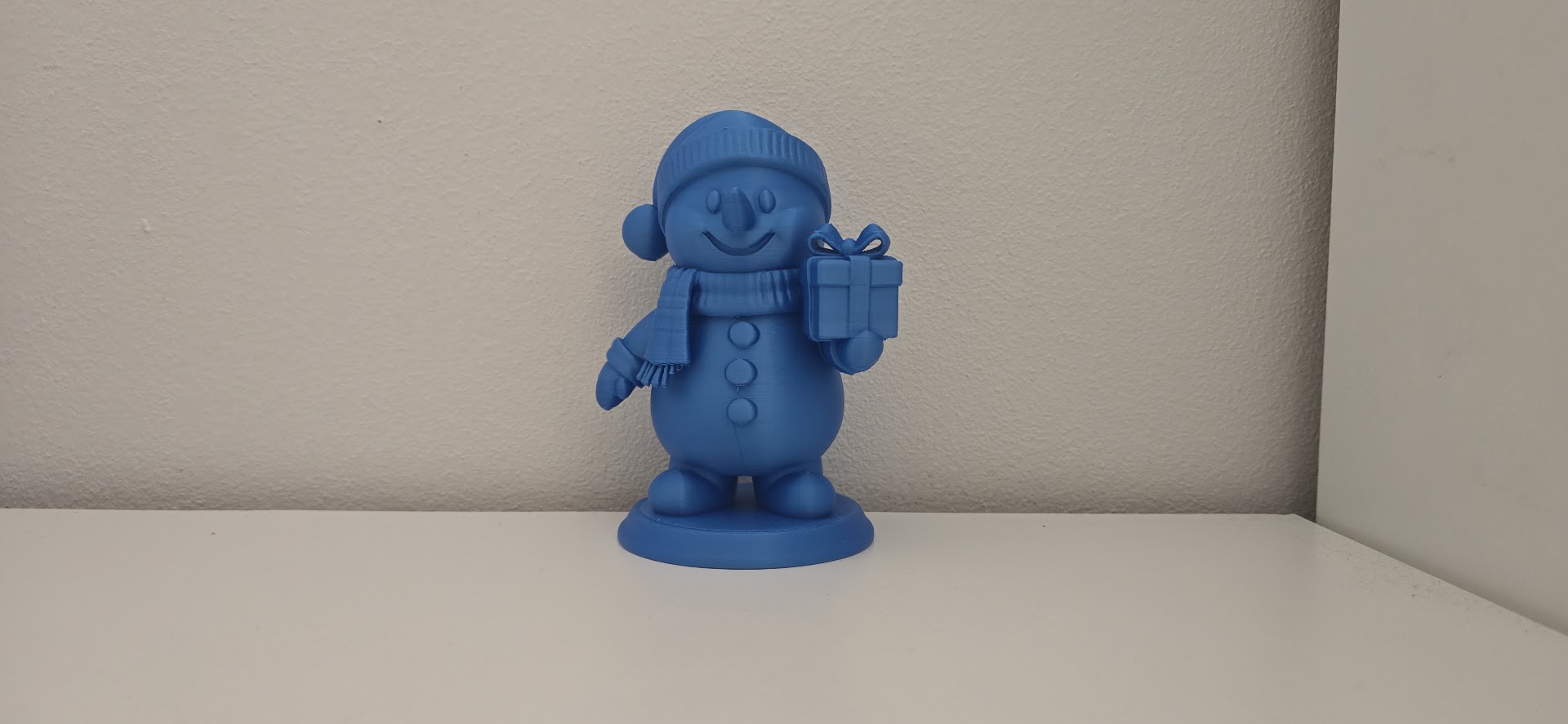 Cheerful Snowman Present Delivery Figurine