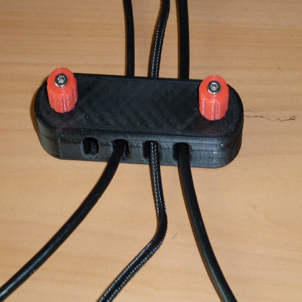Desk cable organiser (number of slots selectable in OpenSCAD)