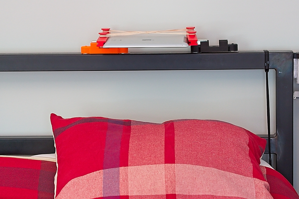 Din rail mount for iPad to watch while laying in bed