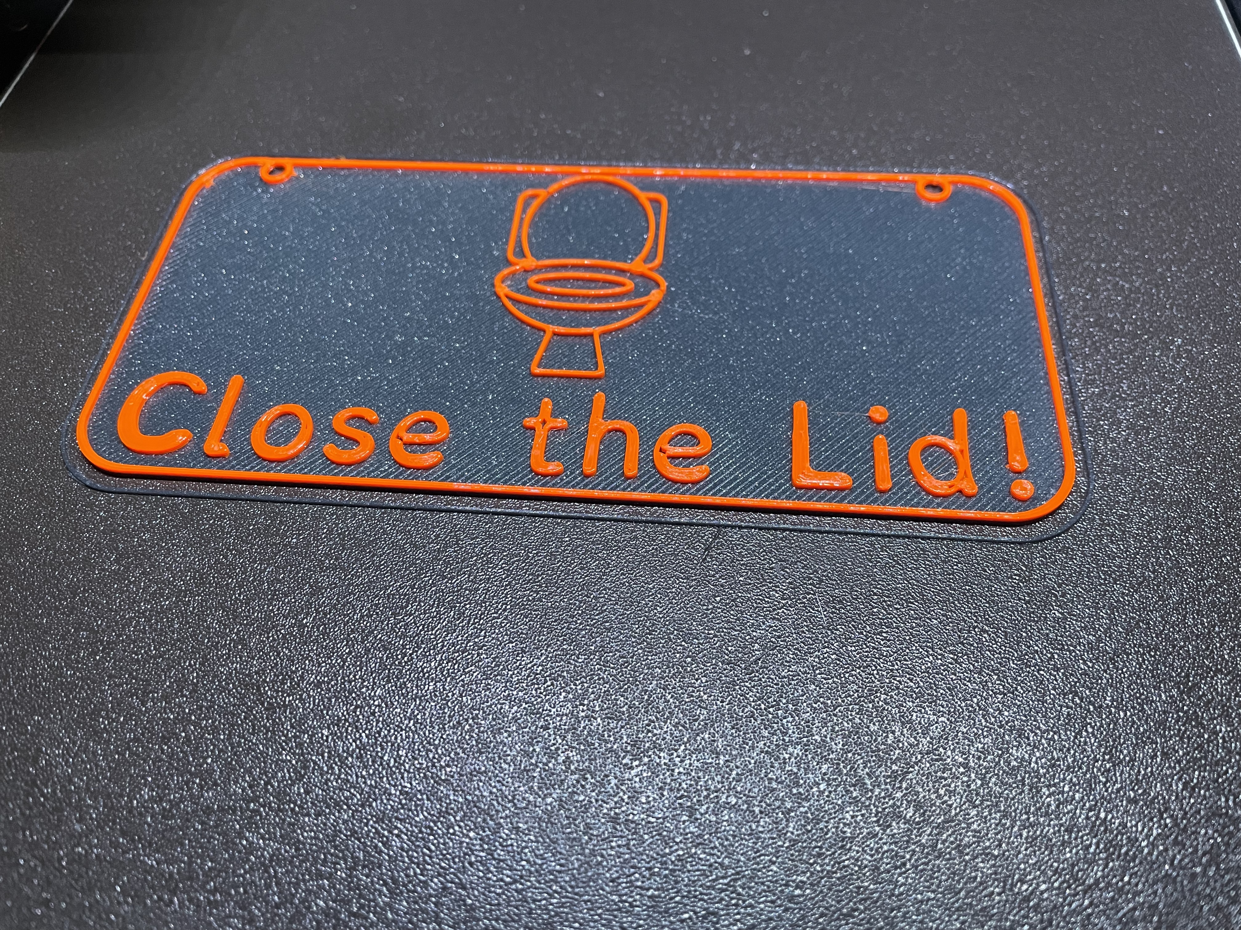 Close the toilet lid sign