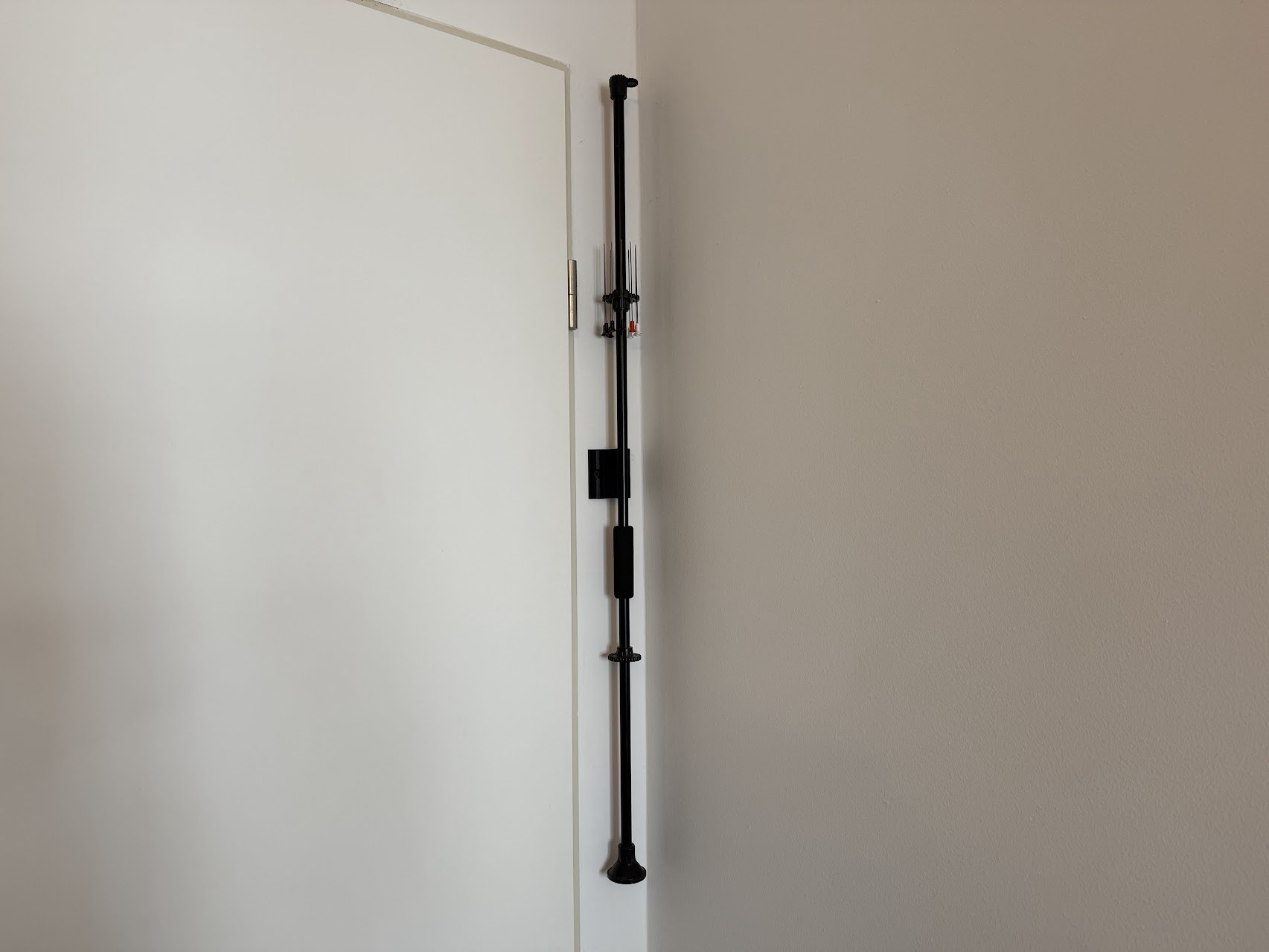 Blowgun wall mount