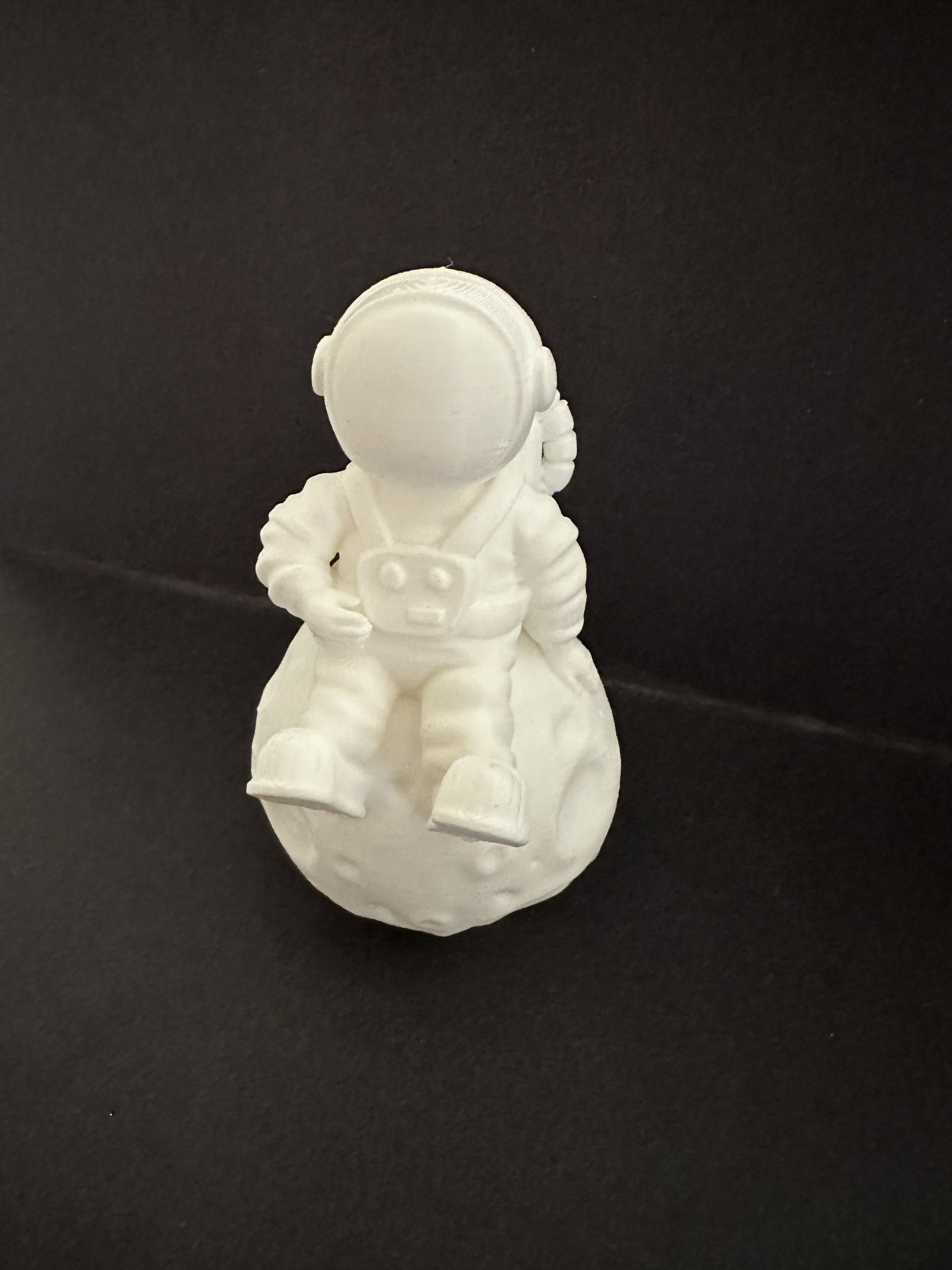 Astronaut sitting on the moon