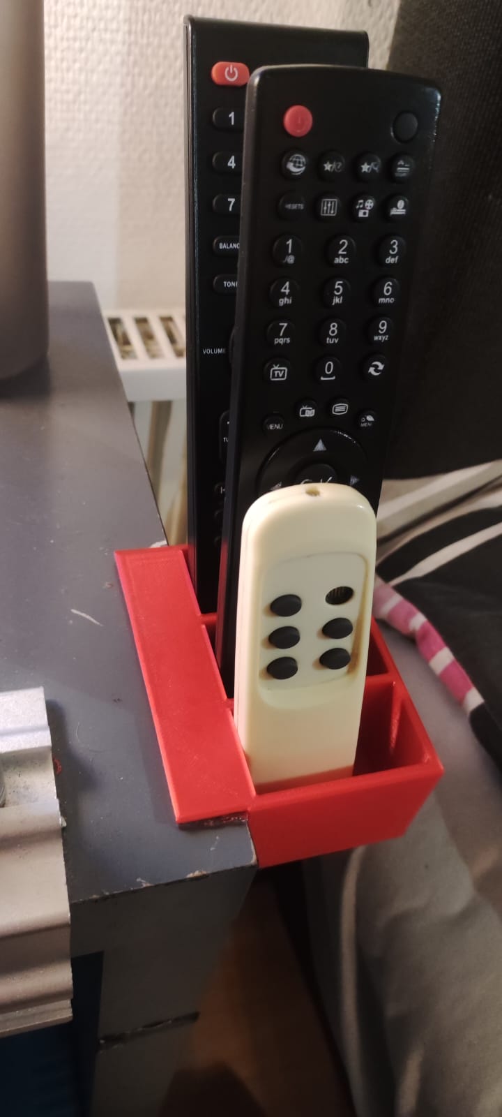 Remote holder with a clean design by lil_steini Download free STL