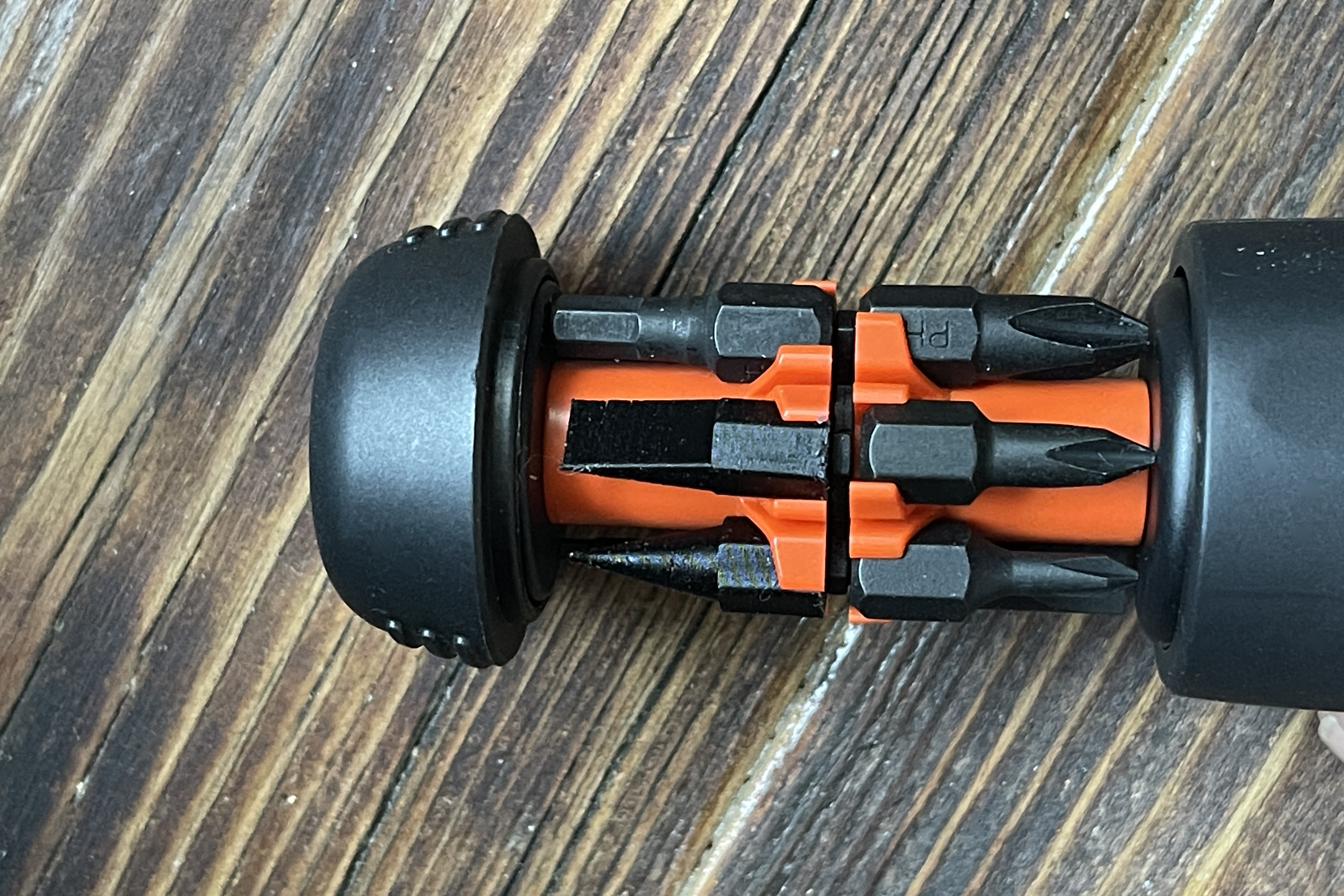 Plastic spudger and pick for LTT screwdriver storage