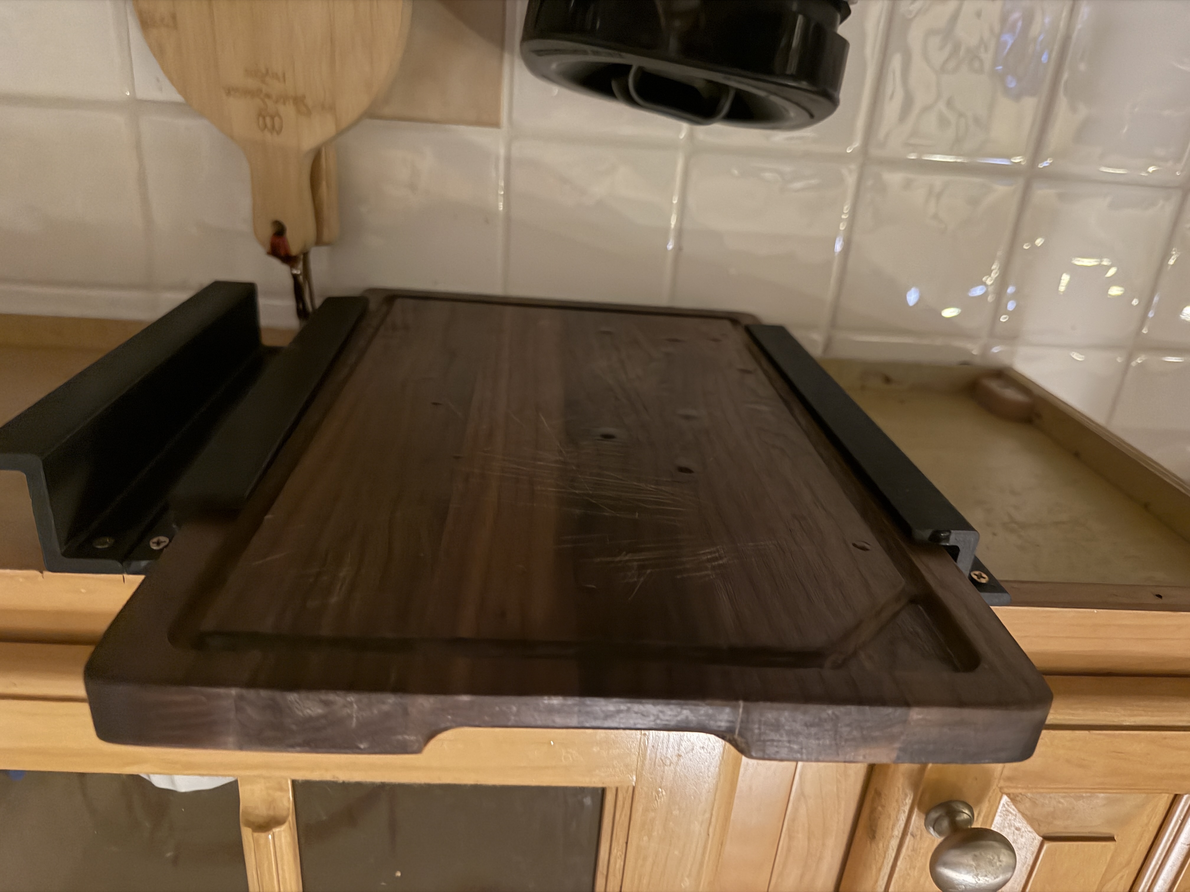 Undercabinet Mounted Cutting Board Holder