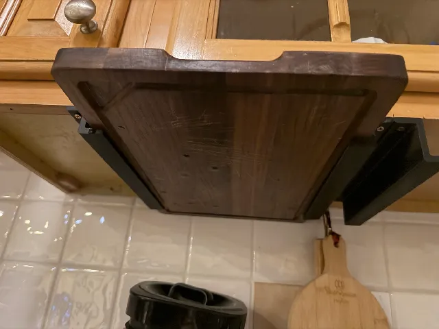 Undercabinet Mounted Cutting Board Holder