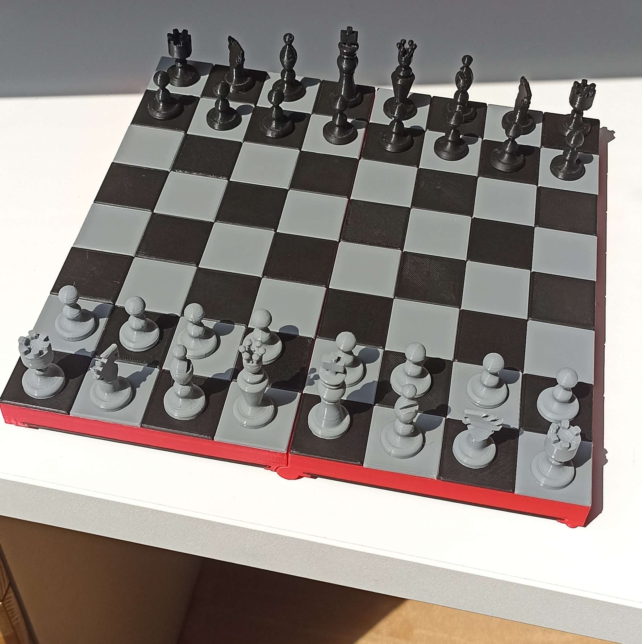 Foldable chess and checkers set
