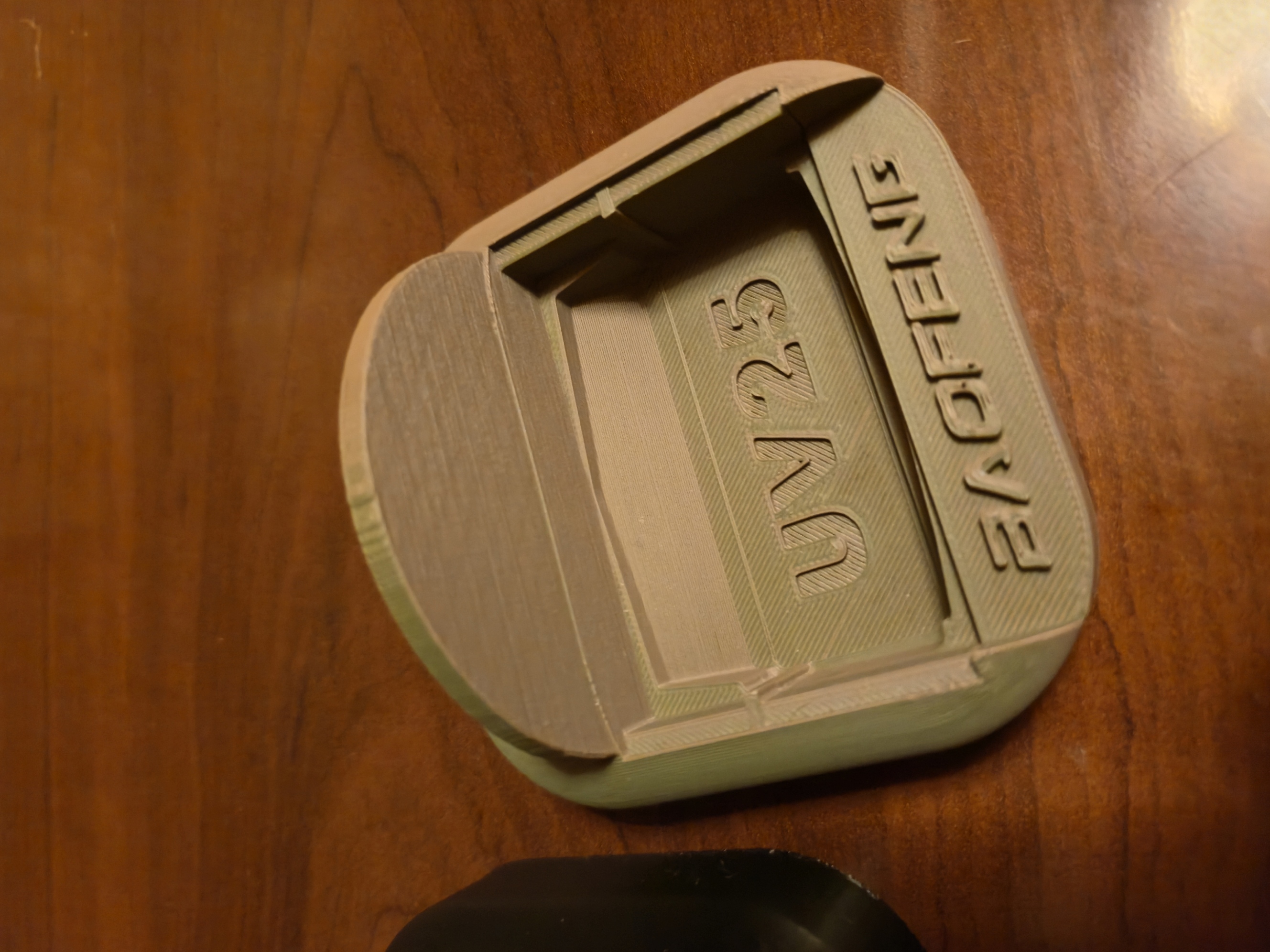 Baofeng UV25 base with three antenna storage holes.