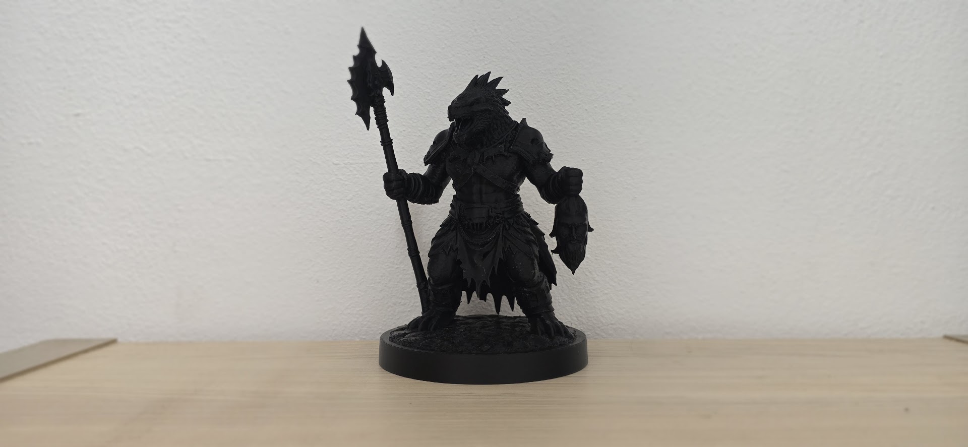 Black Lizardfolk Warrior with Halberd and Trophy Head