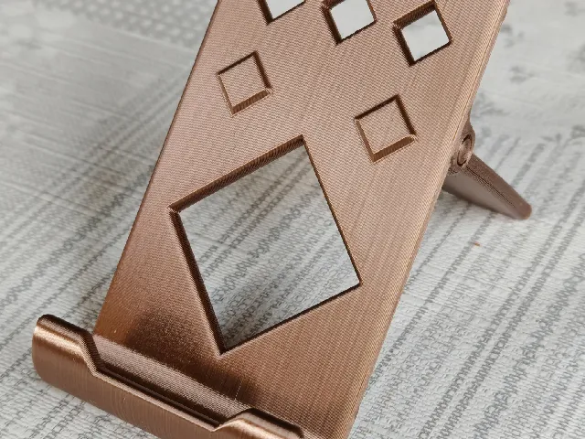 Phone stand with hinges (print in place, no supports)
