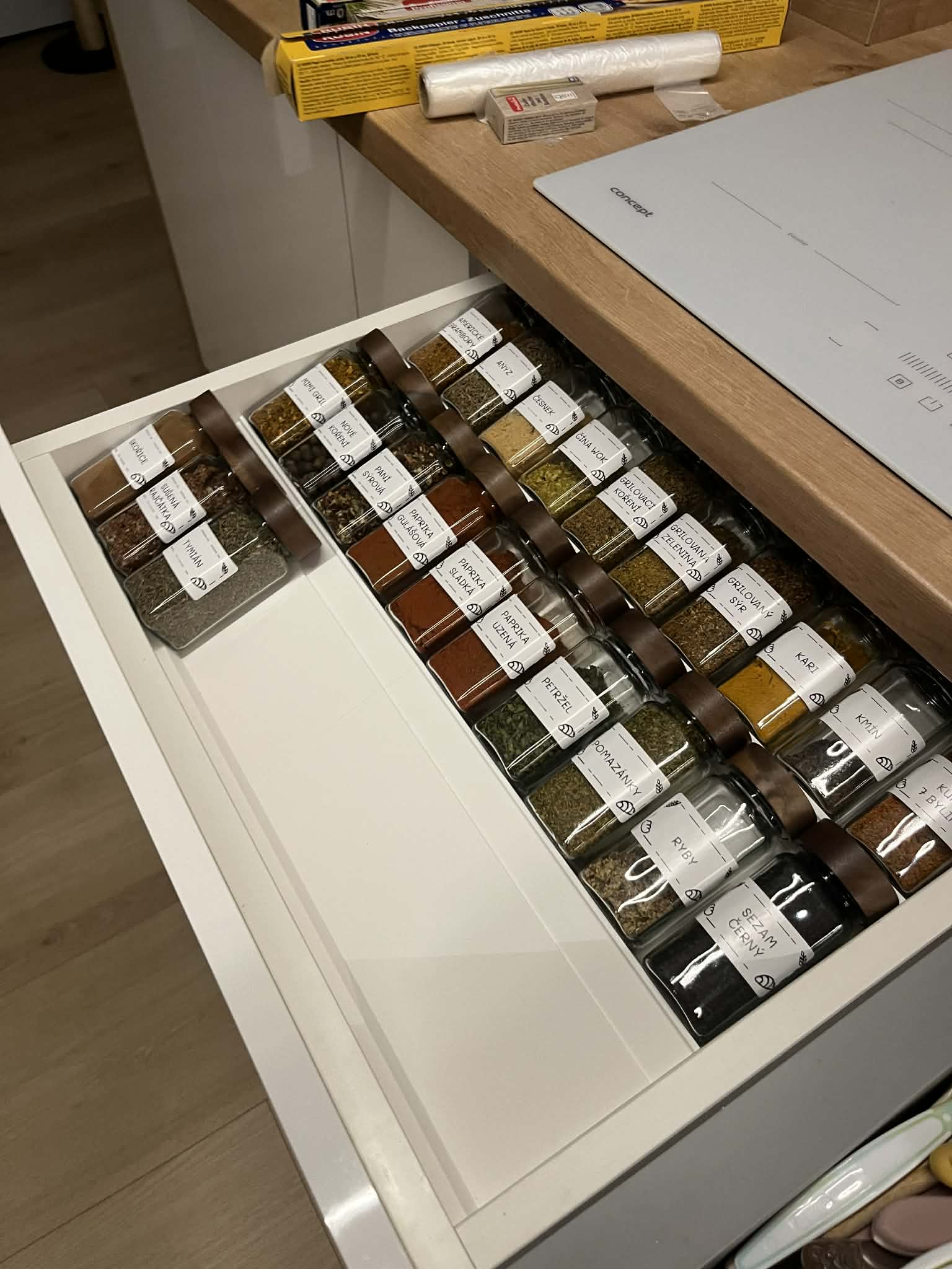 Kitchen drawer organizer for spice jars
