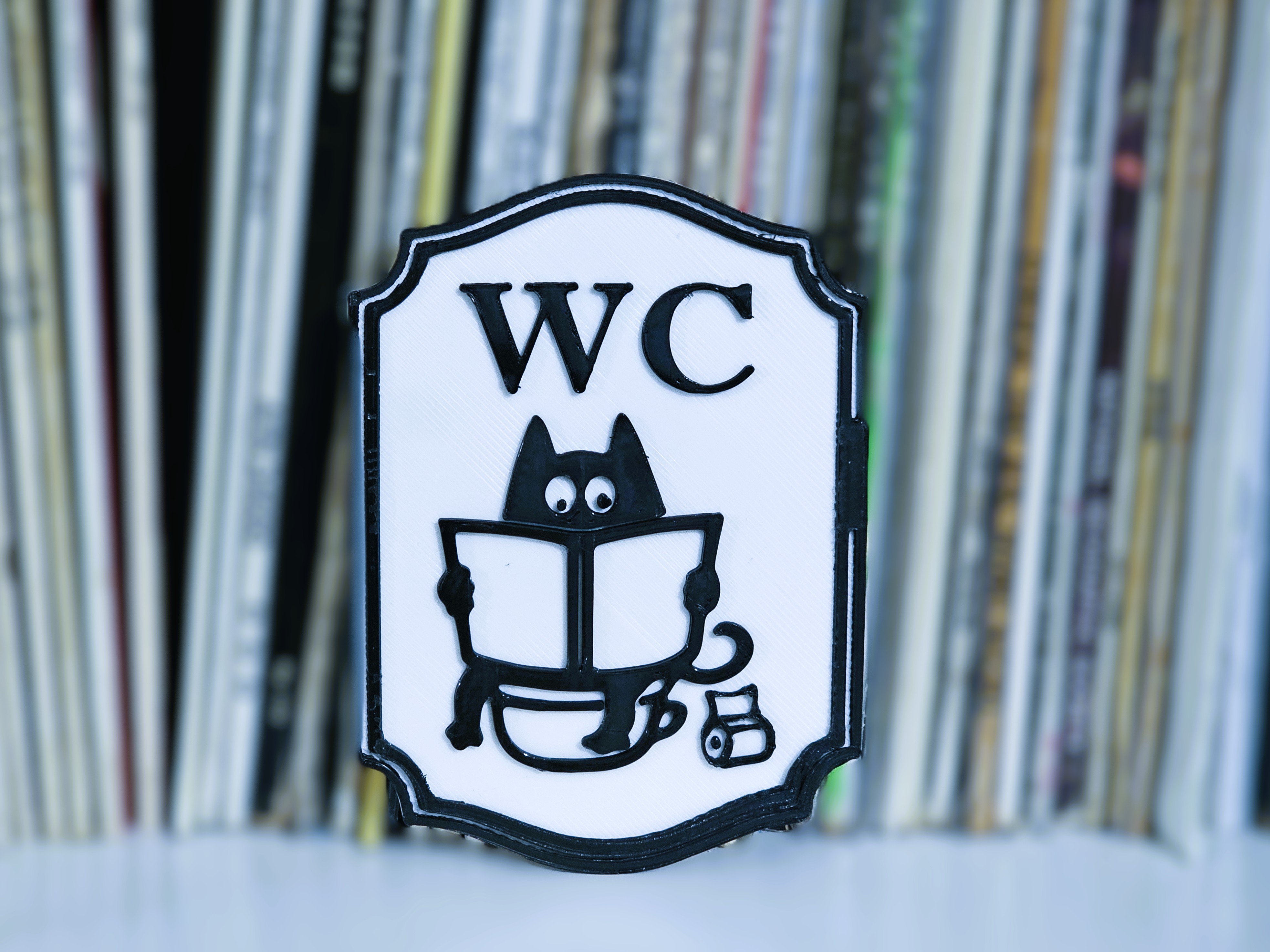 Cat is reading - Toilet sign