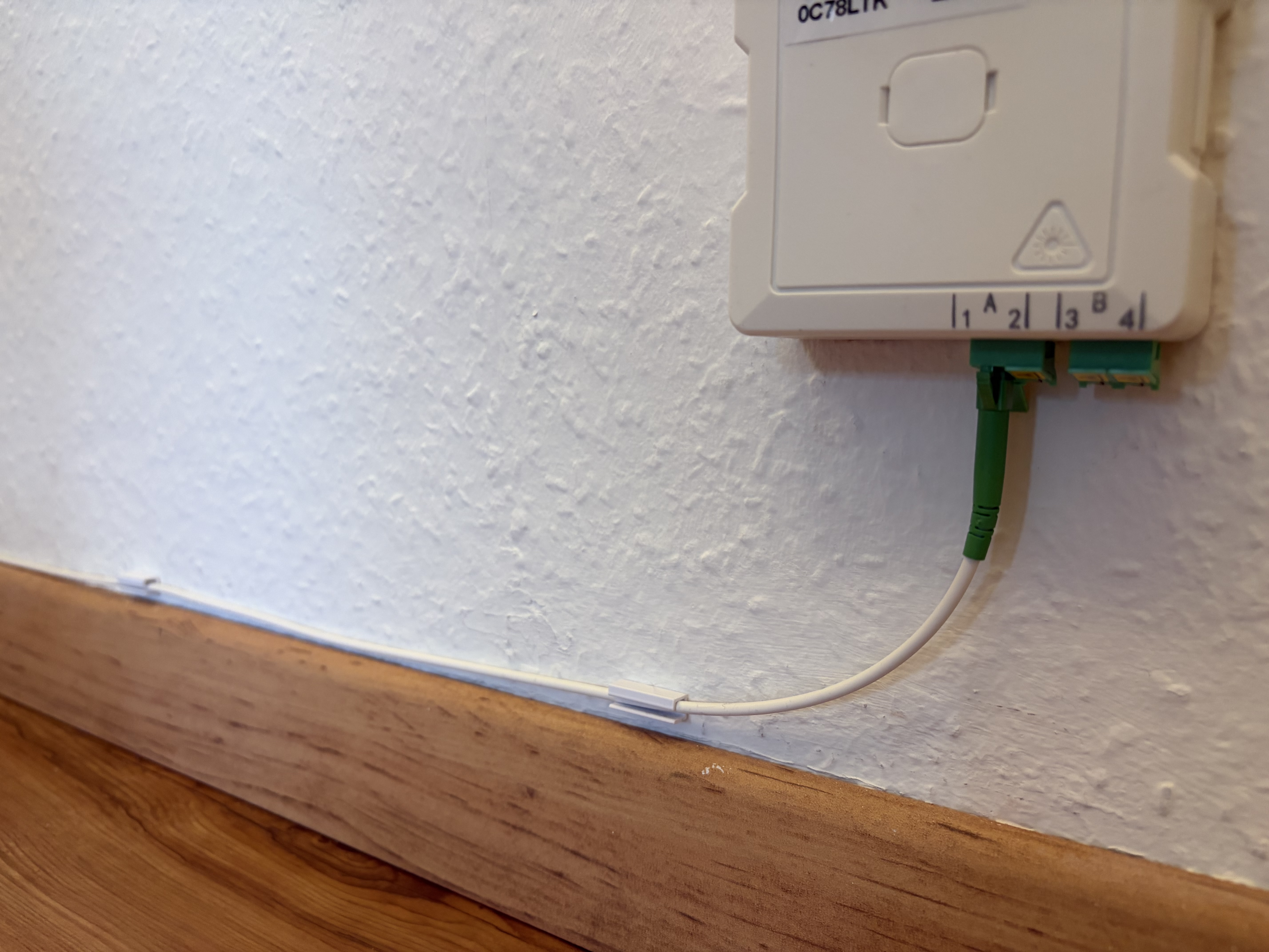 Clip for fiber-optic cable