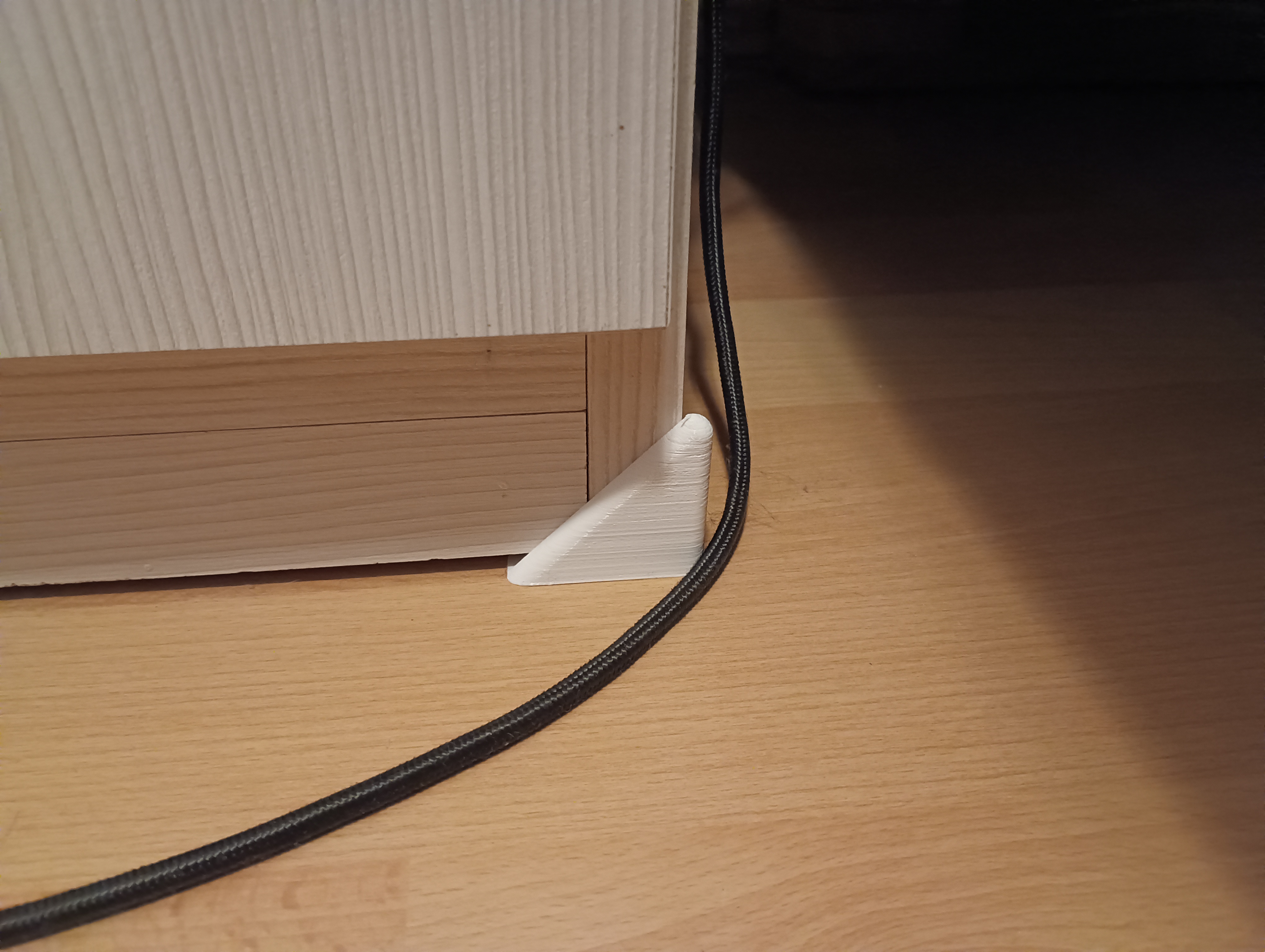Cabinet corner cable protector