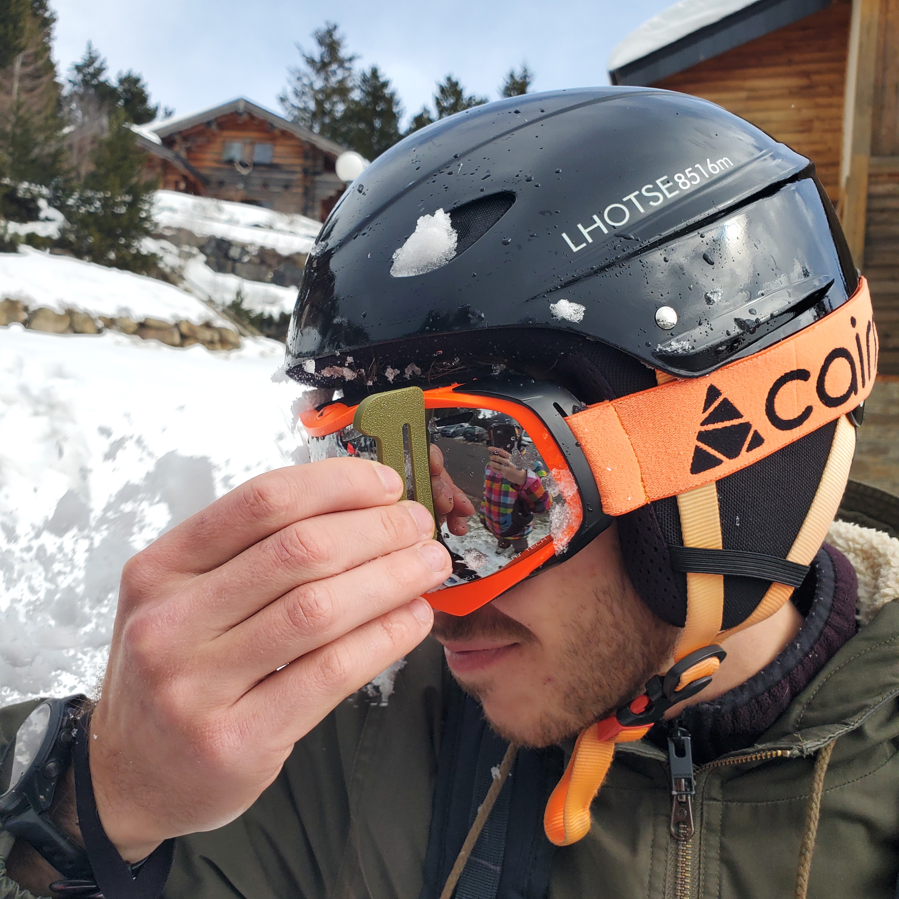Clip-On Ski Goggle Scraper with Bottle Opener