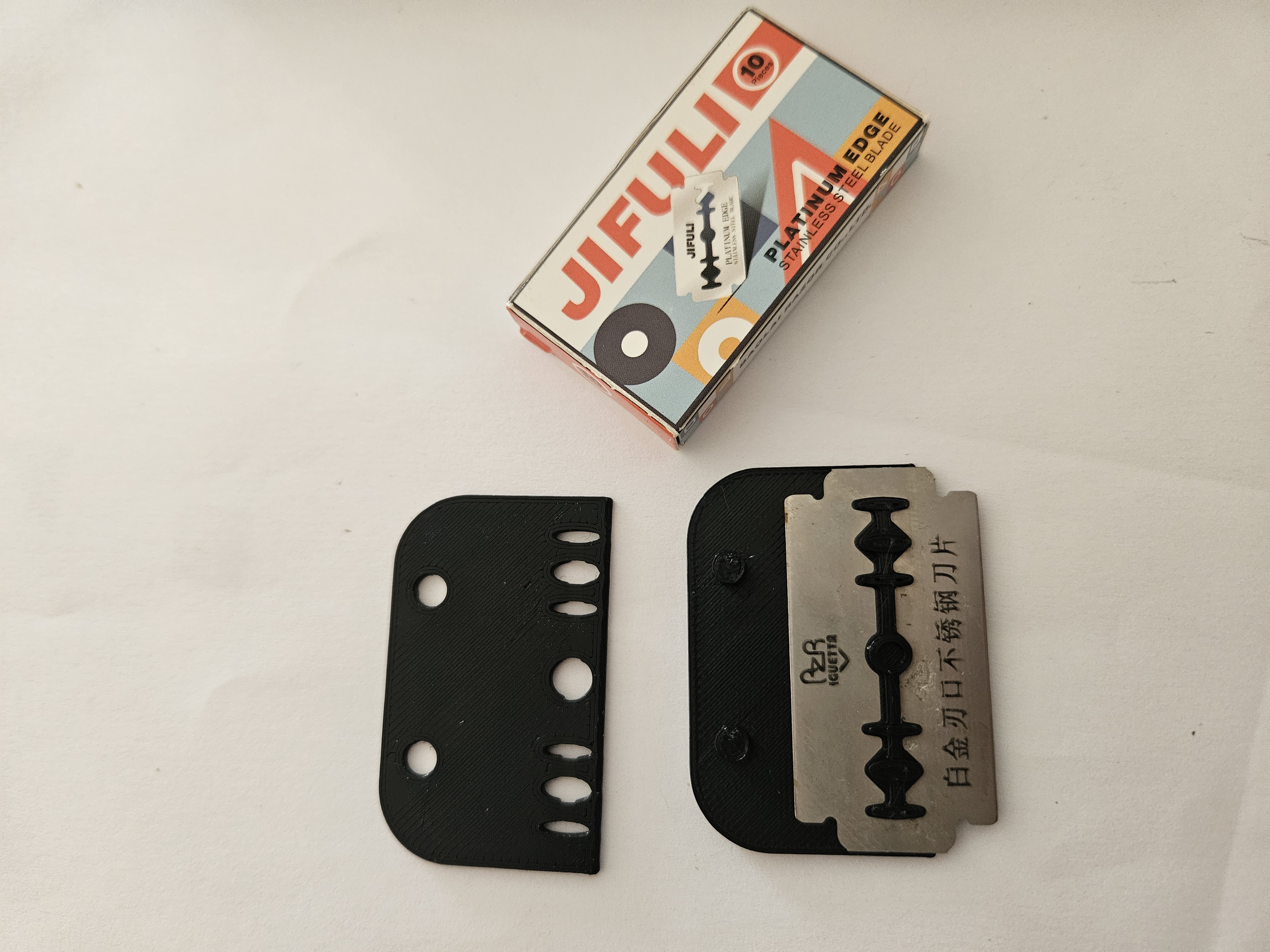 Razor blade scraper
