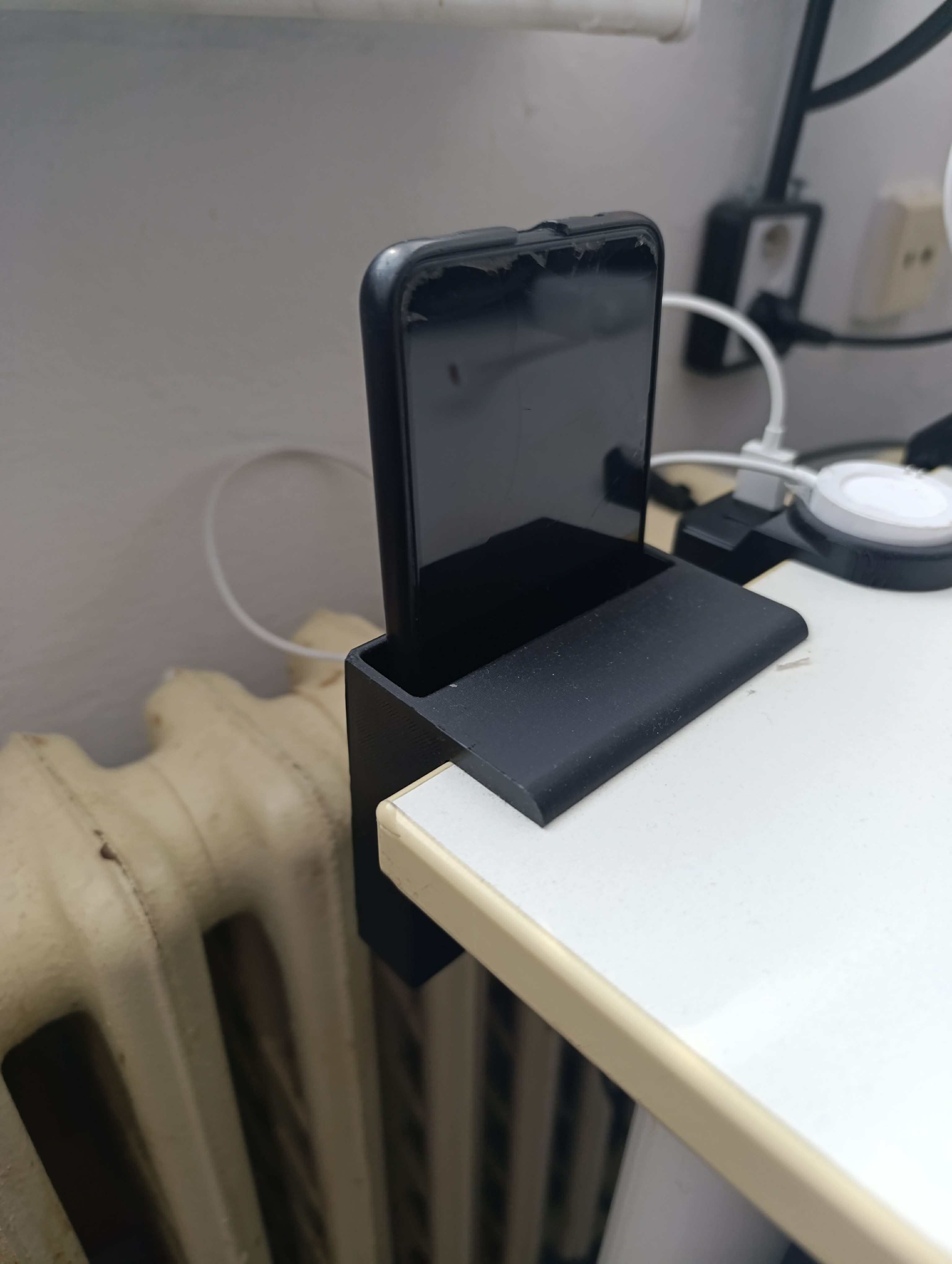 Mobile phone charging holder 3D model